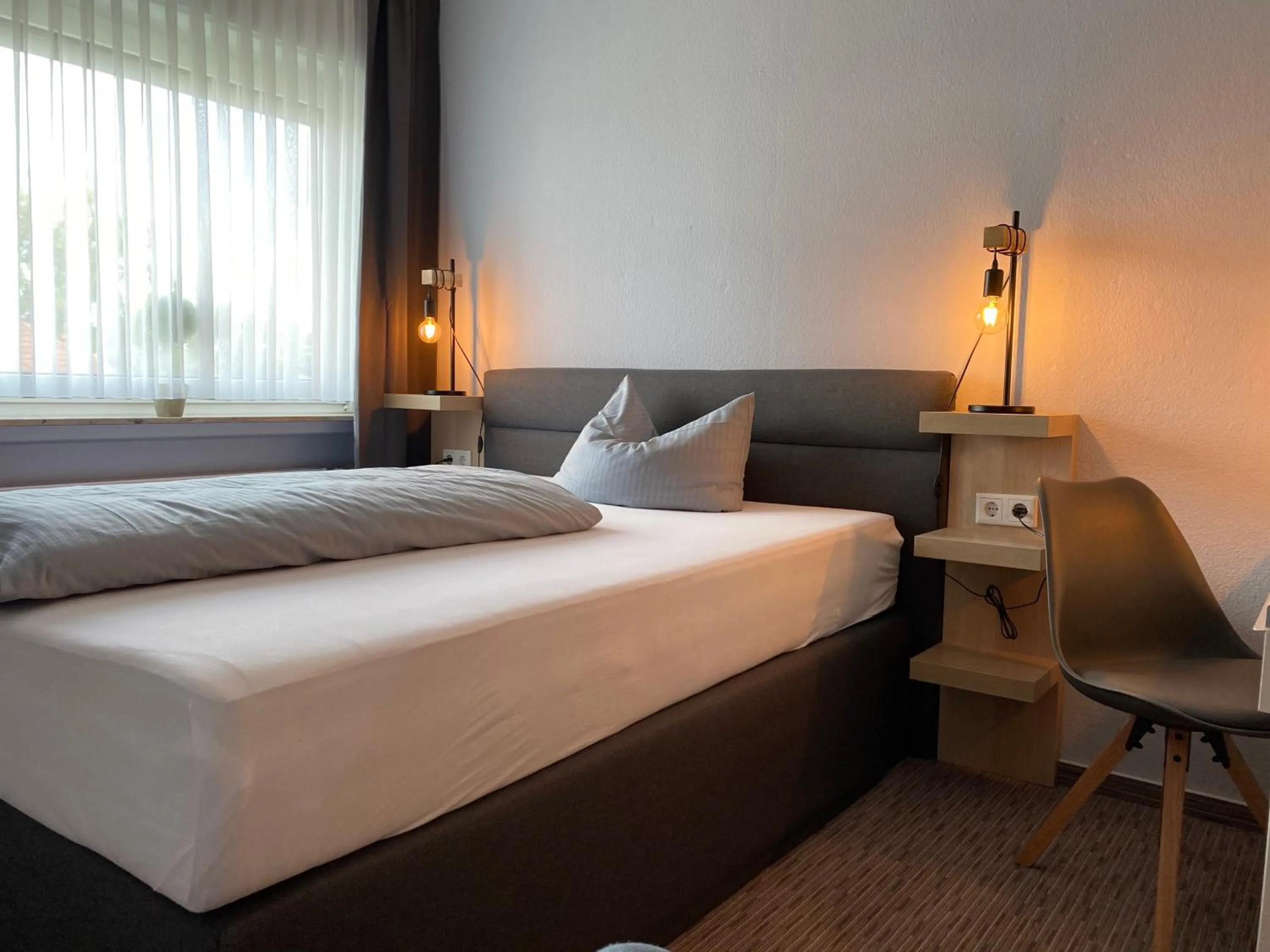 Photo of the whole room, Bed in Weinhotel Römerbad