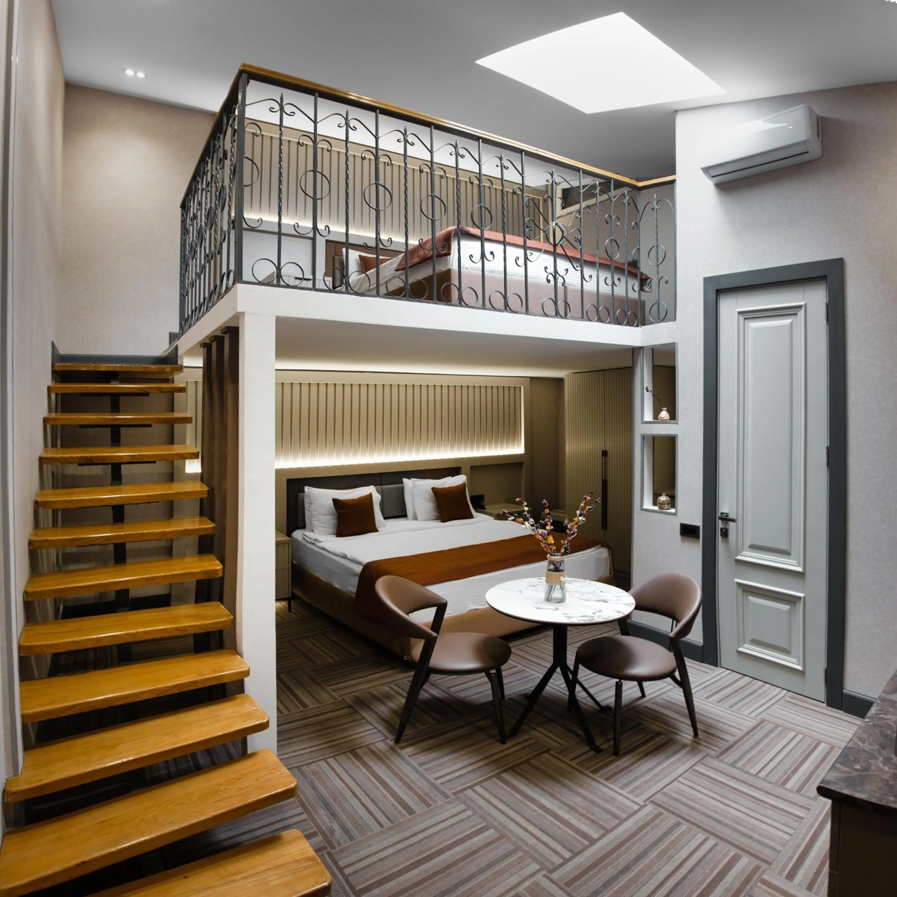 Bed in Nizami Central Park Hotel