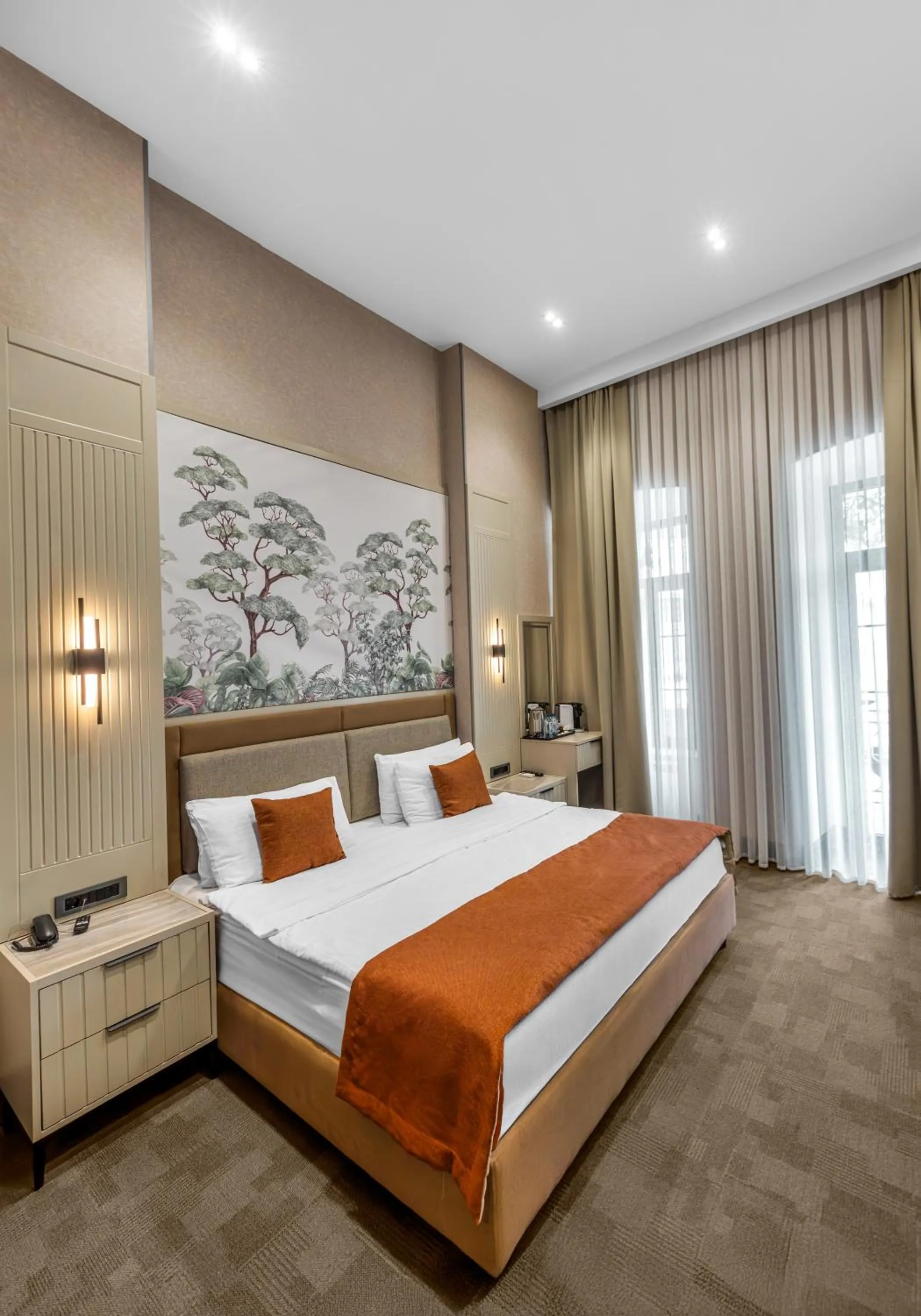 Bed in Nizami Central Park Hotel