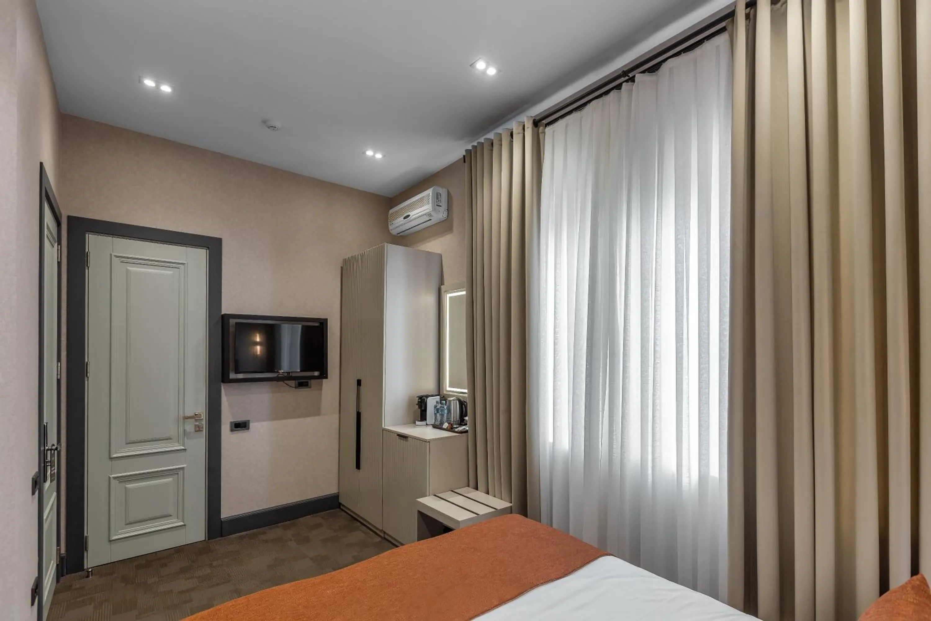 Bed in Nizami Central Park Hotel