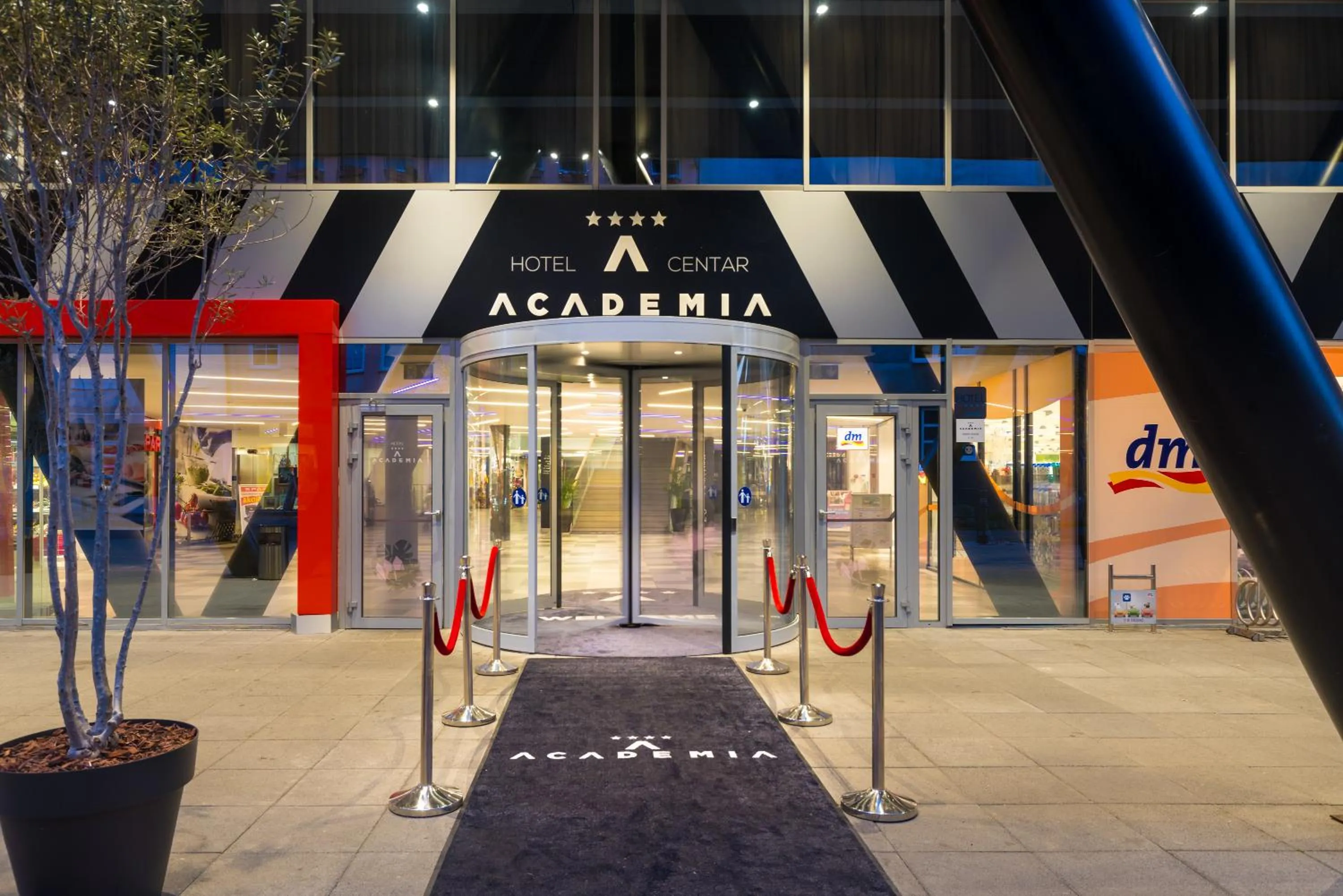 Property logo or sign in Hotel Academia