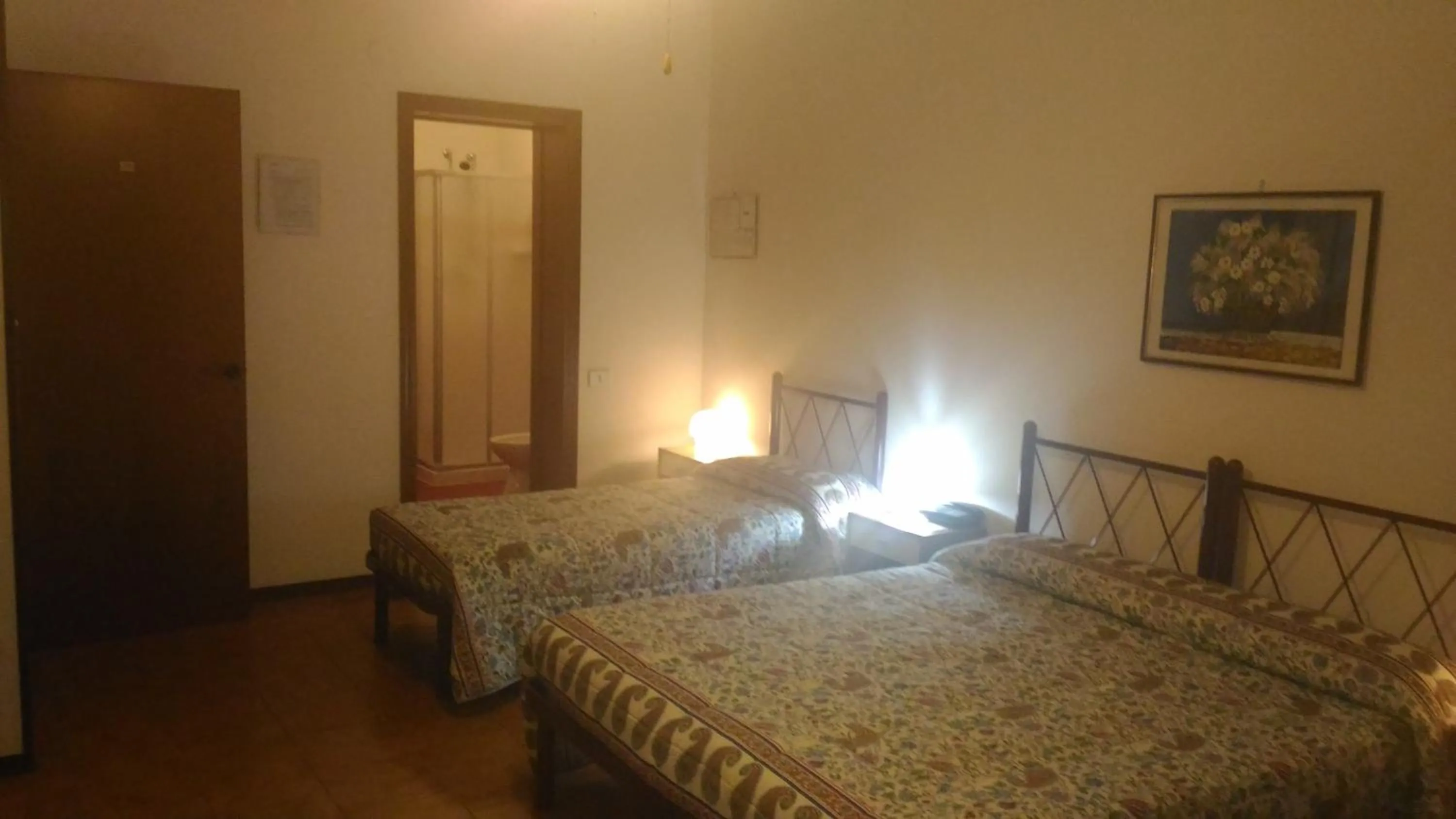 Bed in Pensione Delfino Azzurro