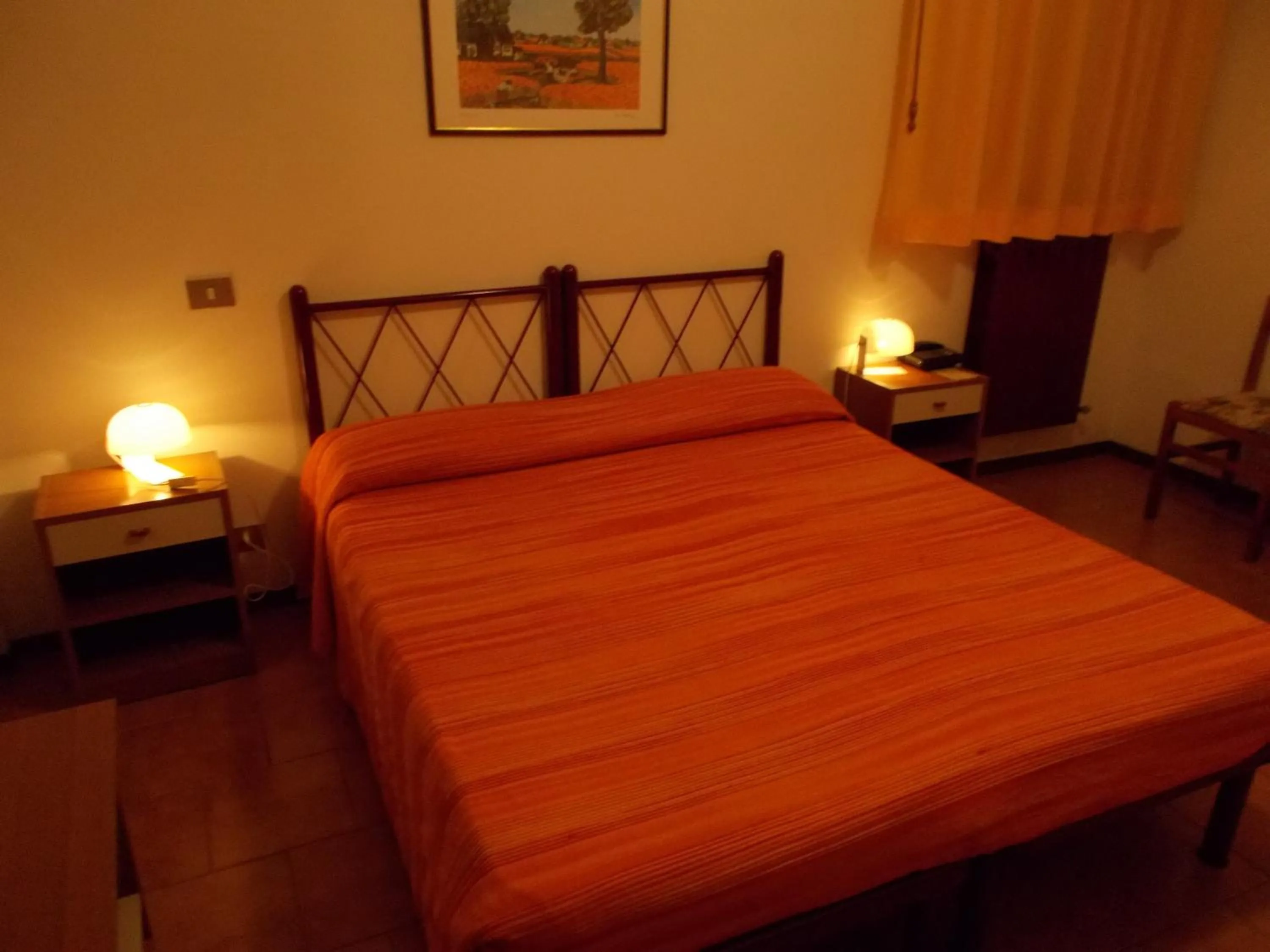 Bed in Pensione Delfino Azzurro