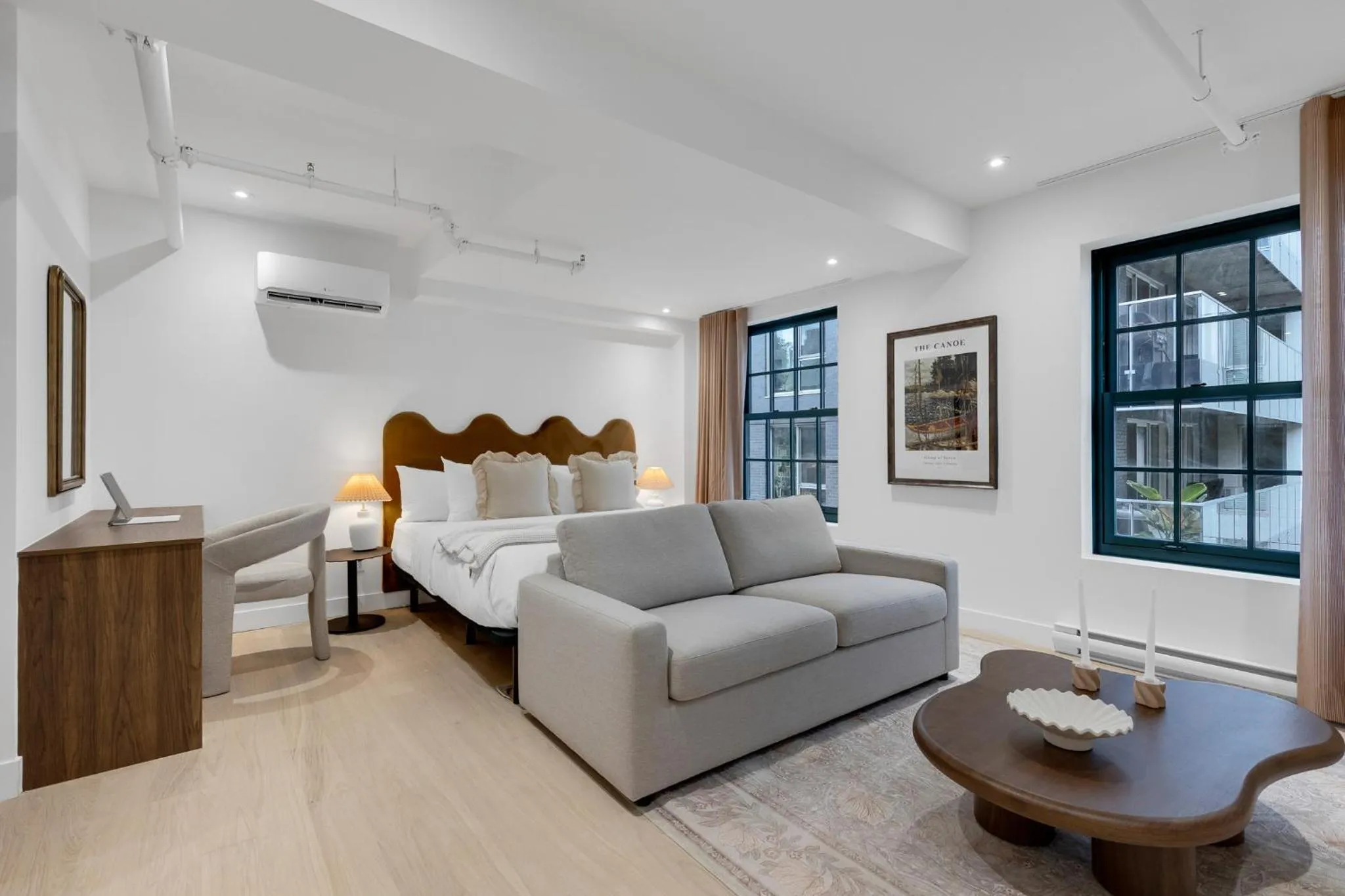 Bed in The Mercer Boutique Hotel