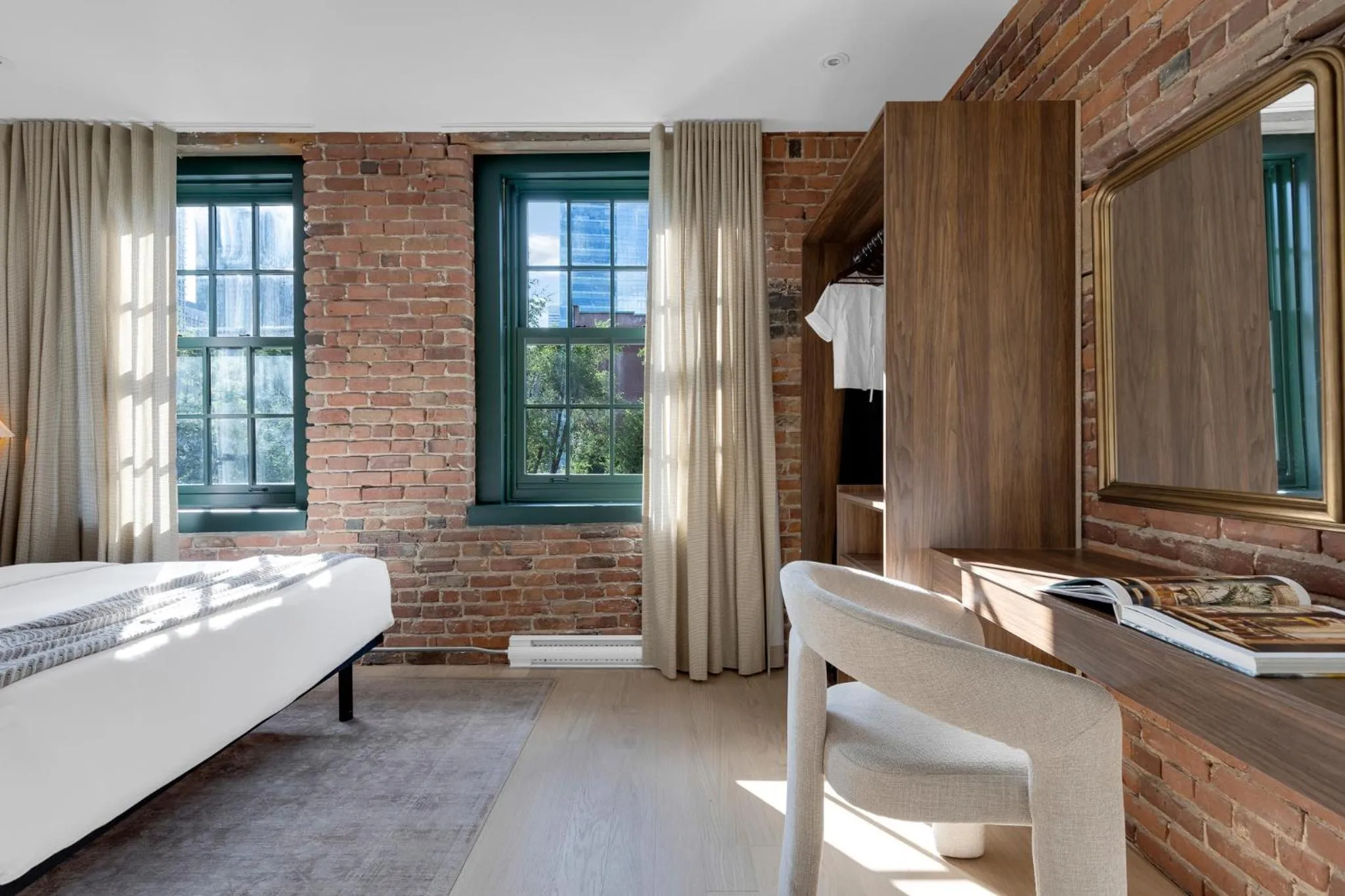 Bed in The Mercer Boutique Hotel