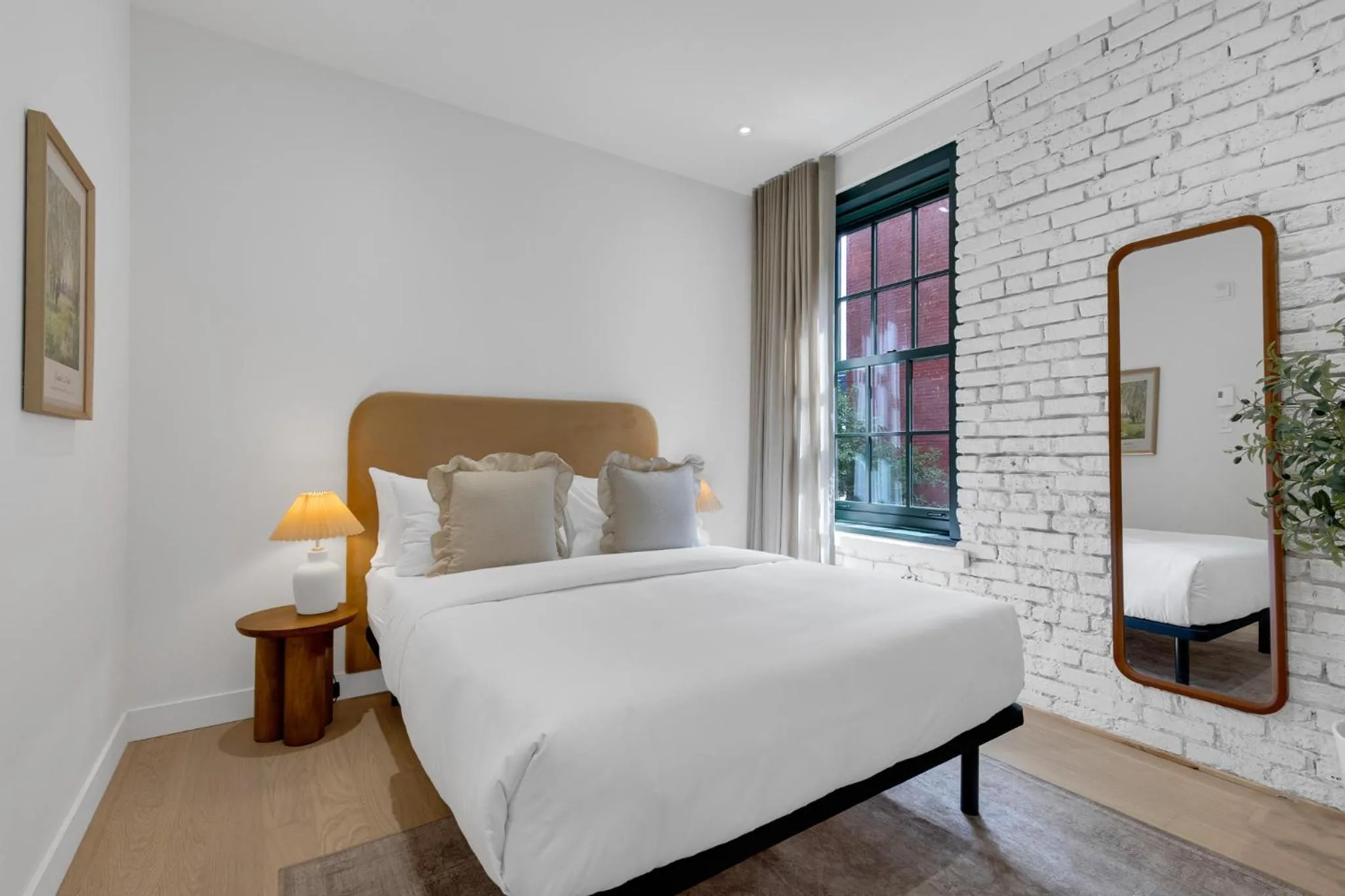 Bed in The Mercer Boutique Hotel