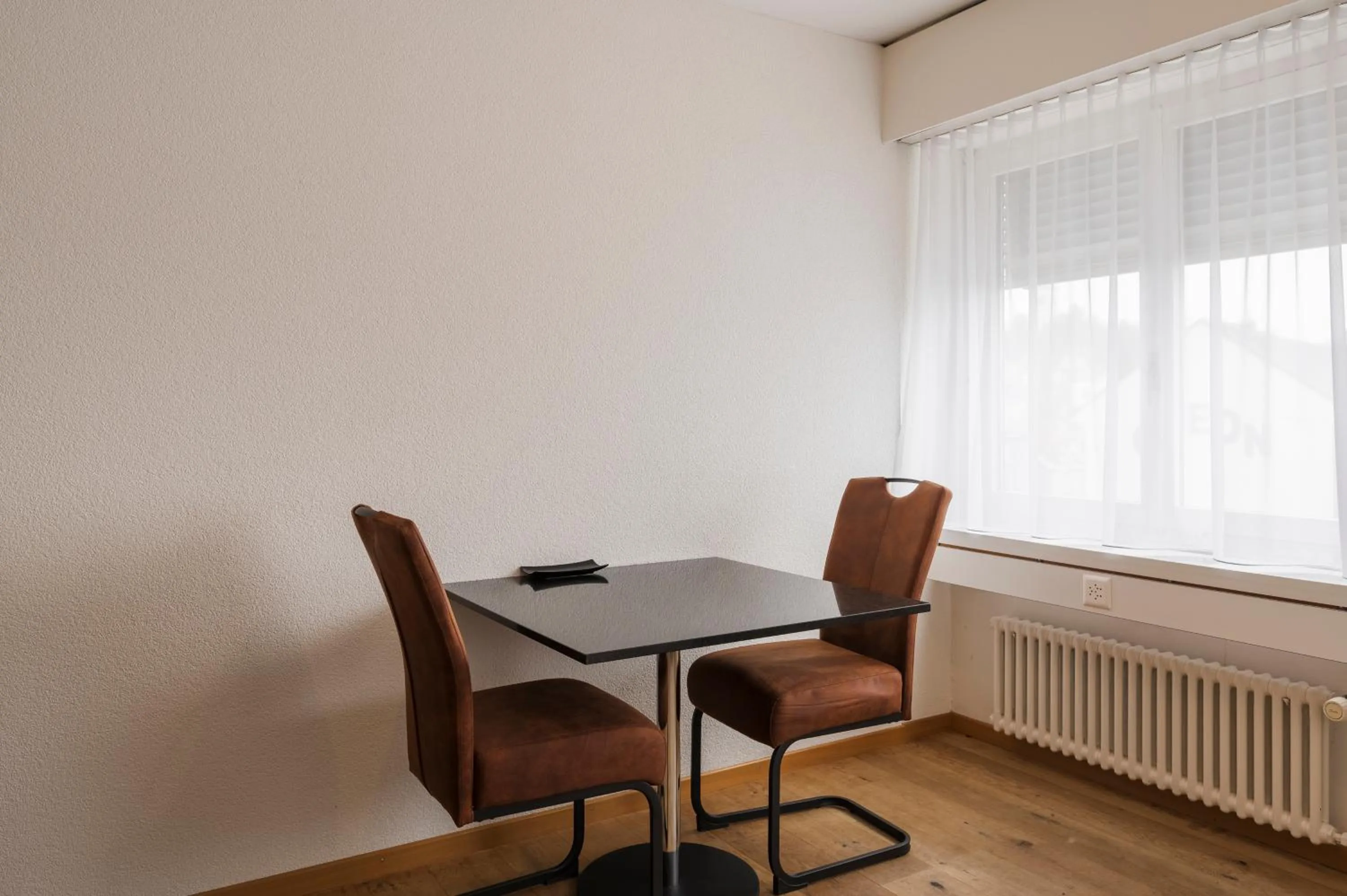 Dining area in Amanthos Living Solothurn