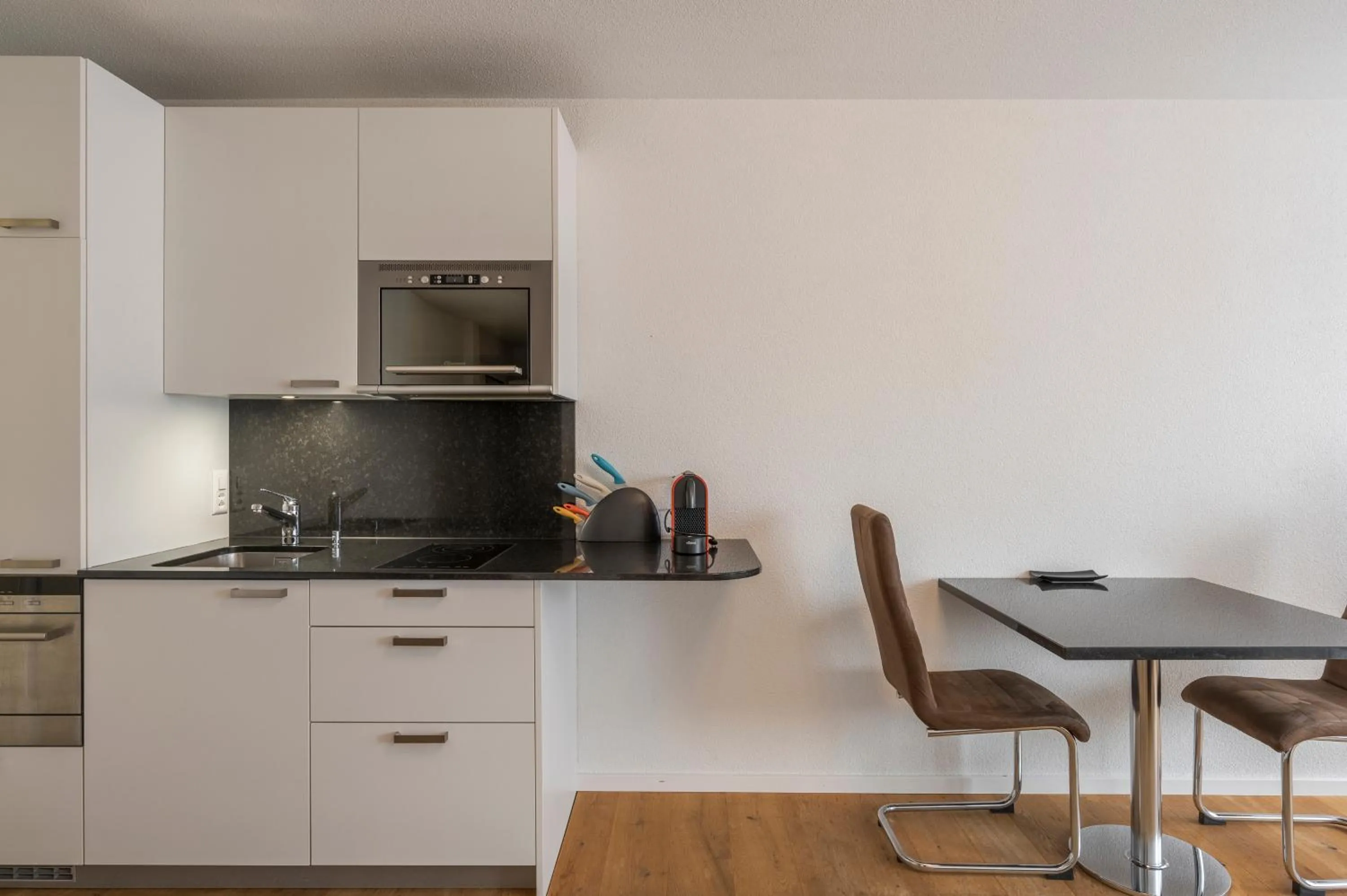 Kitchen or kitchenette in Amanthos Living Solothurn