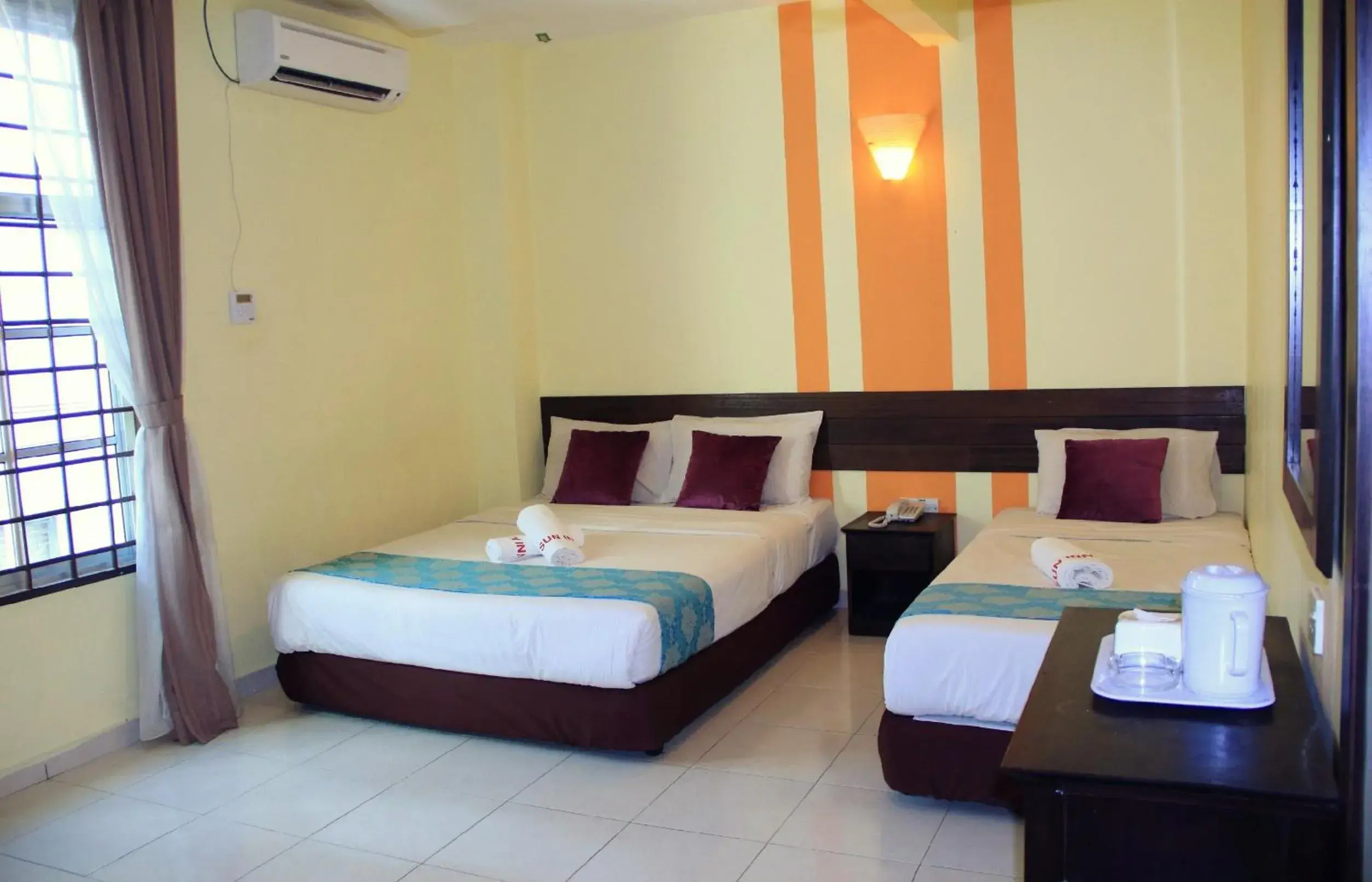 Bed in Sun Inns Rest House Kuantan Bed in Sun Inns Rest House Kuantan