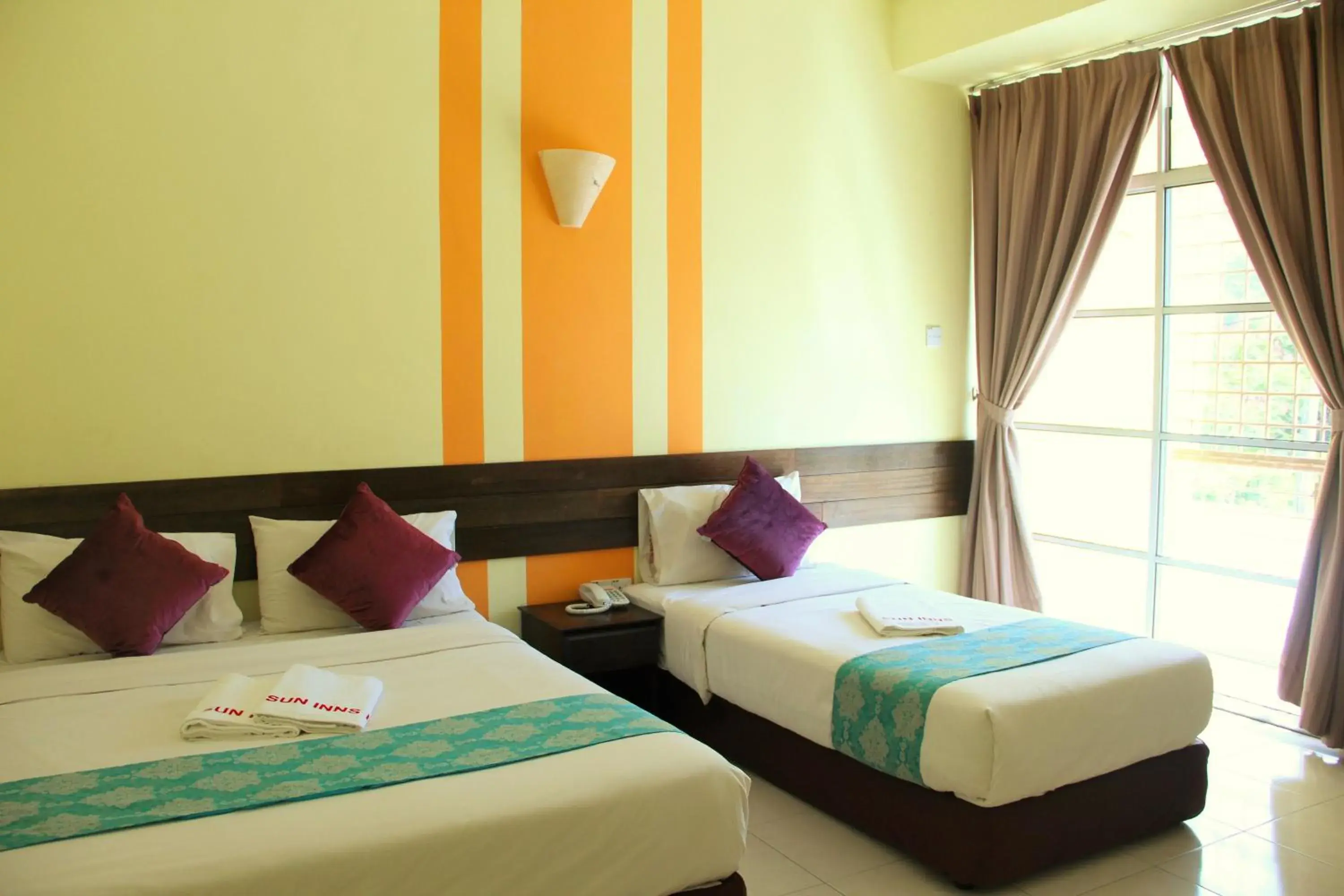 Bed in Sun Inns Rest House Kuantan Bed in Sun Inns Rest House Kuantan