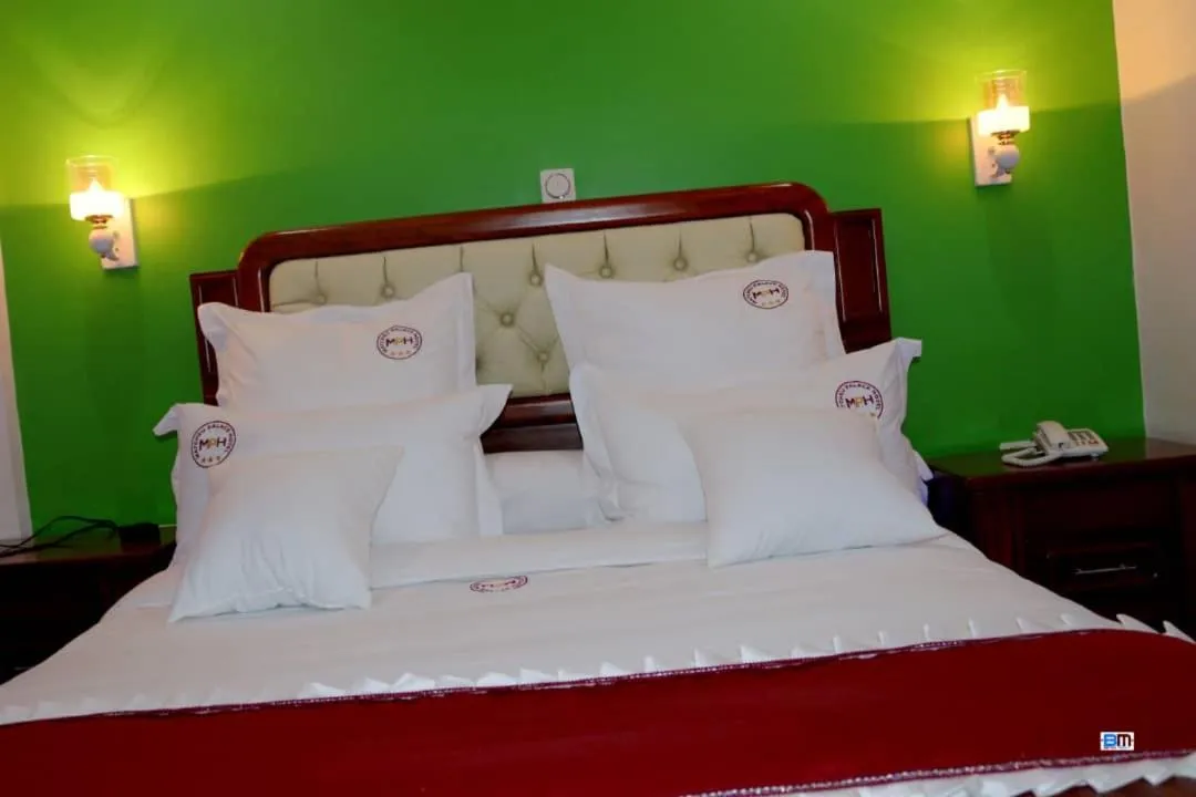 Bed in Matcheu Palace Hôtel