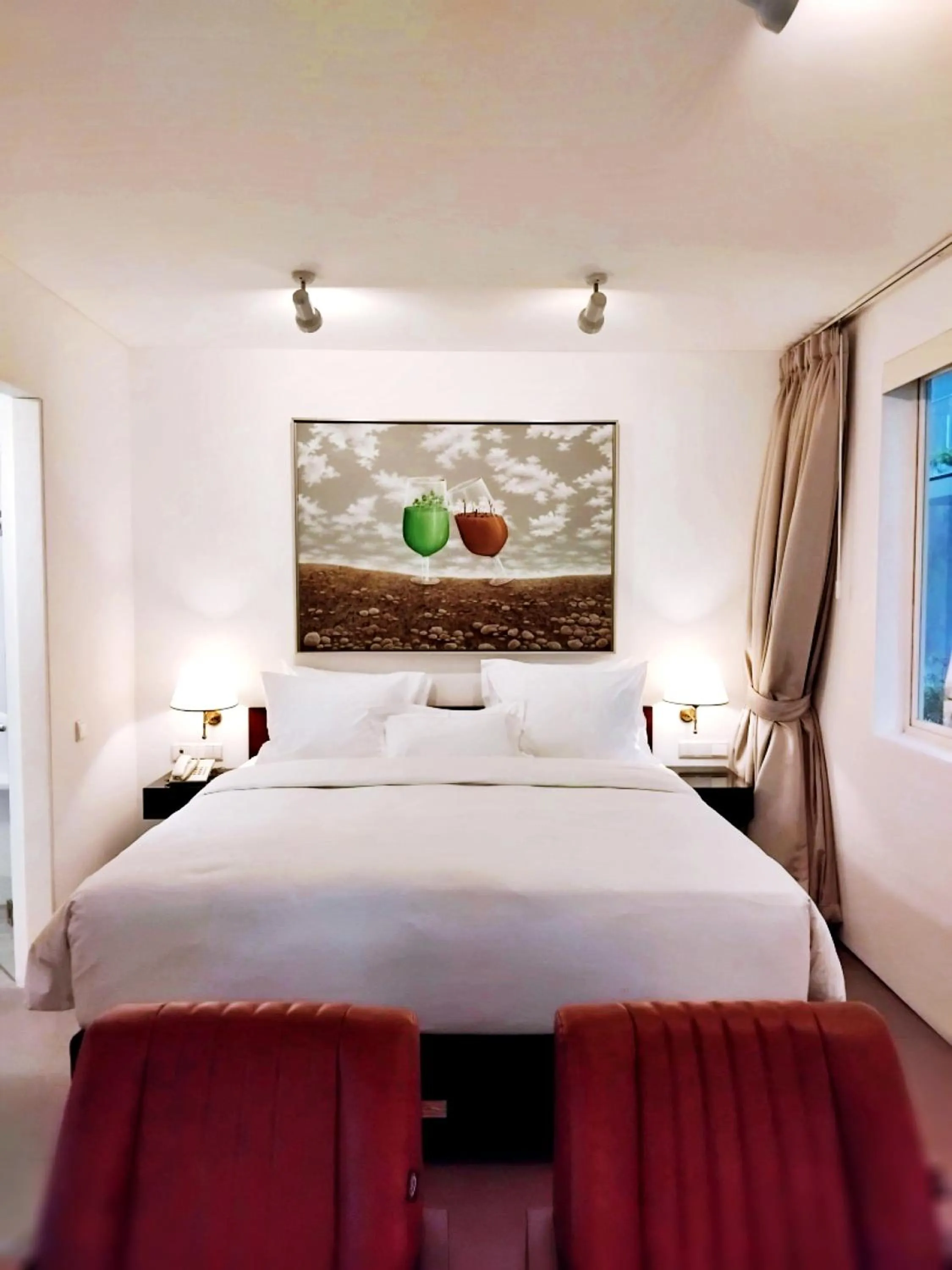 Bed in KoenoKoeni Boutique Hotel