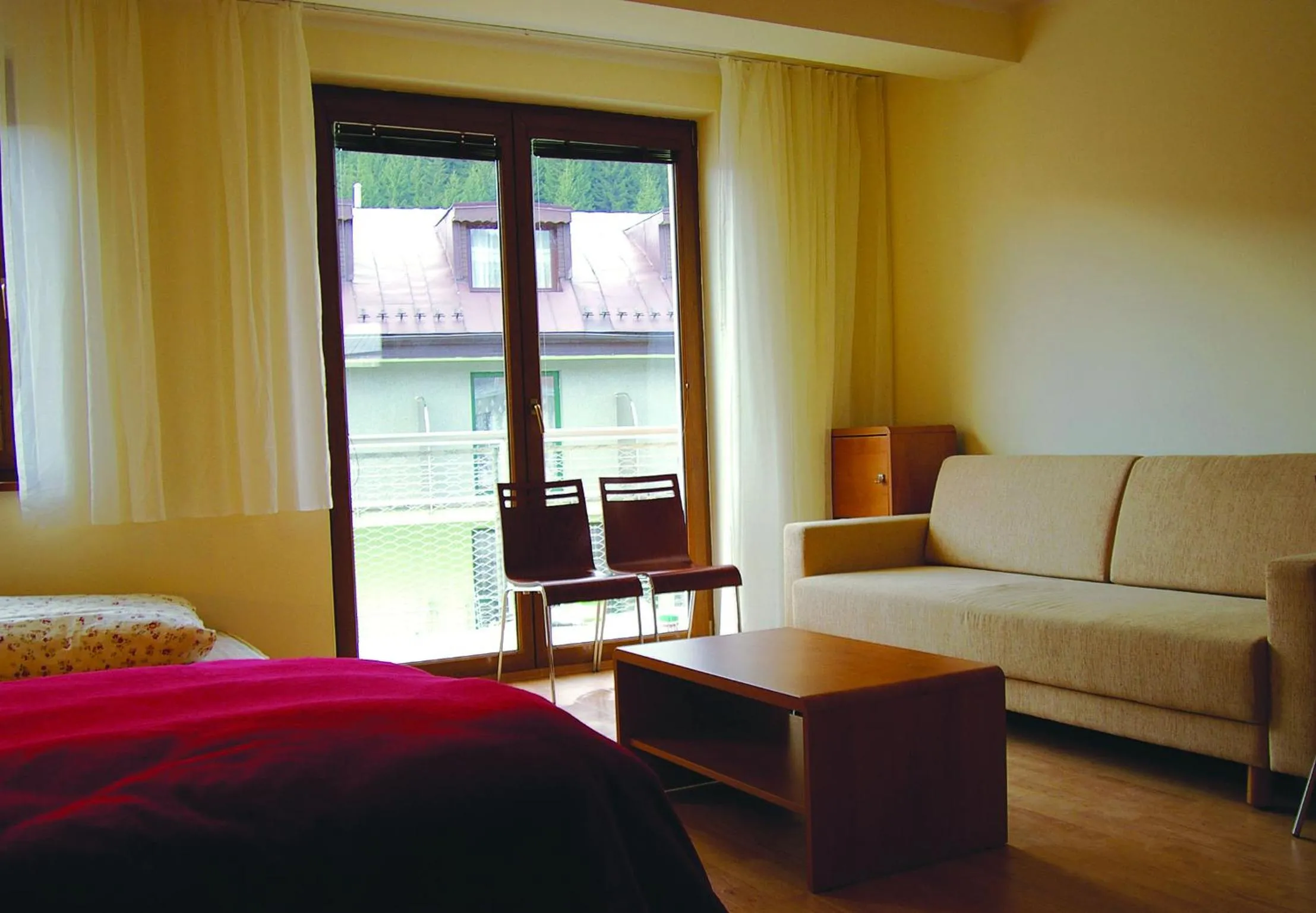 Seating area, Bed in Apartmán 302 Oščadnica