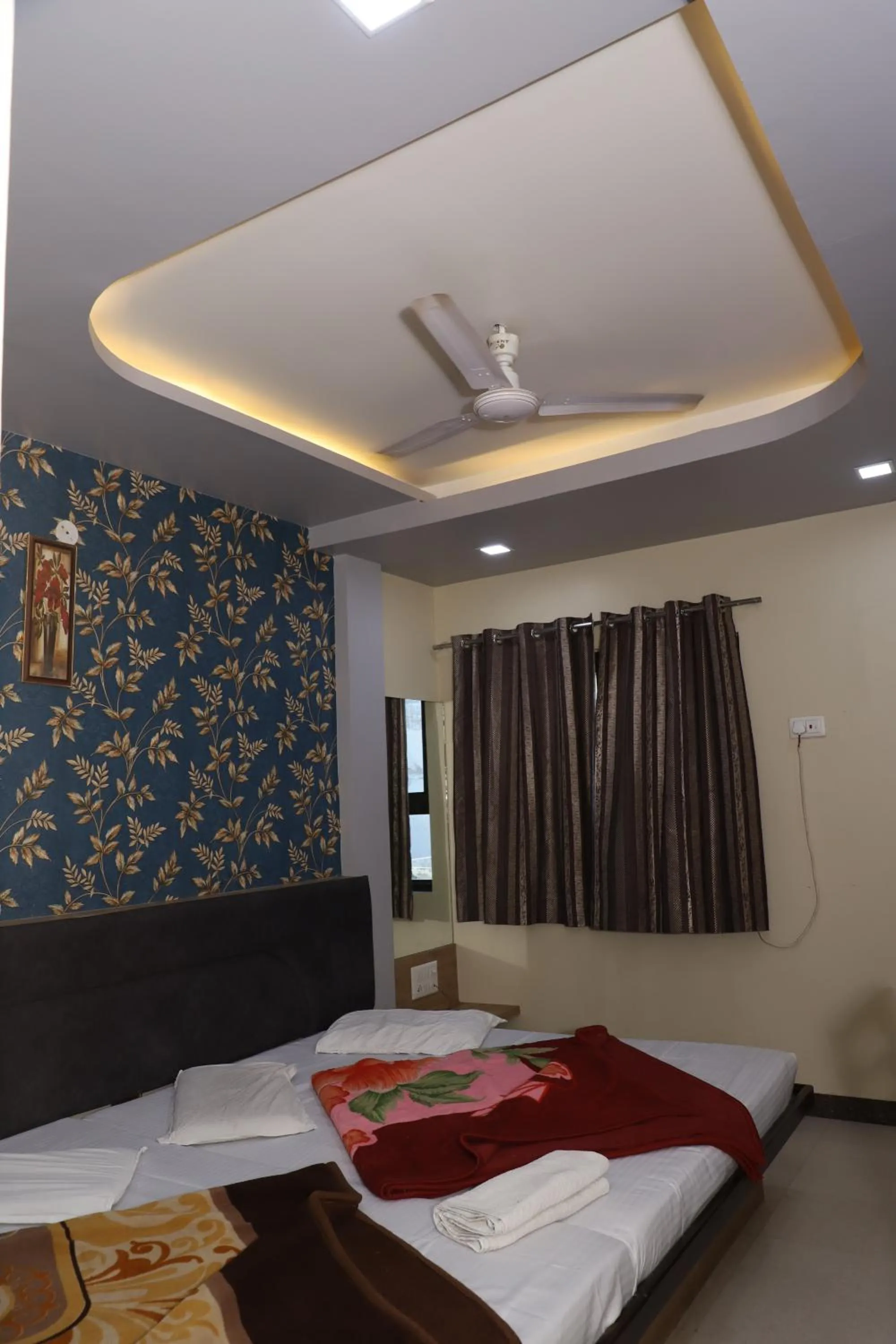 Bed in Hotel Mittal Inn