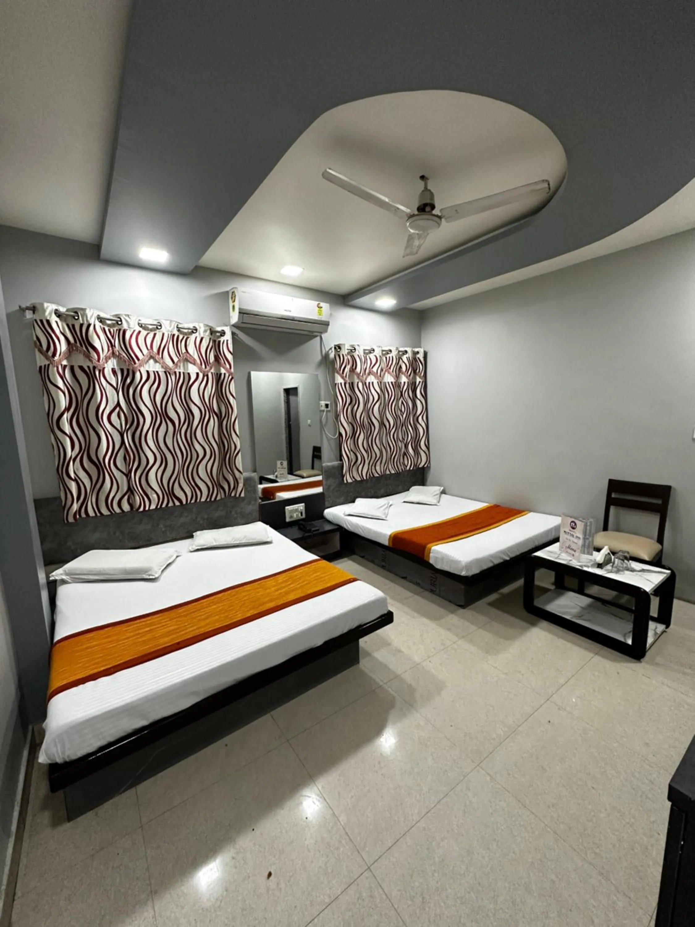 Bed in Hotel Mittal Inn