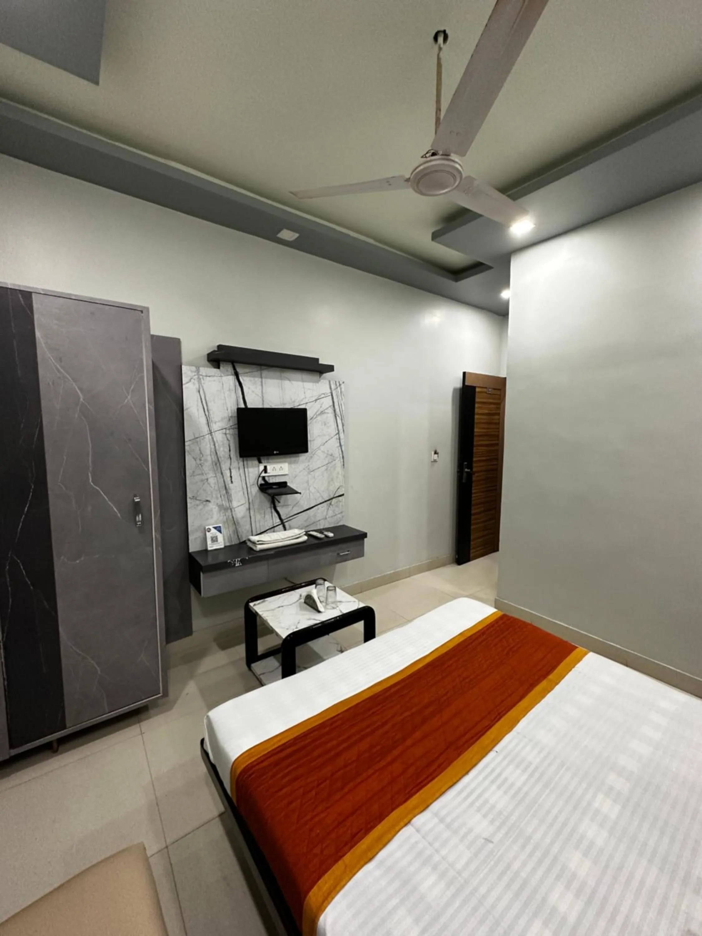 Bed in Hotel Mittal Inn