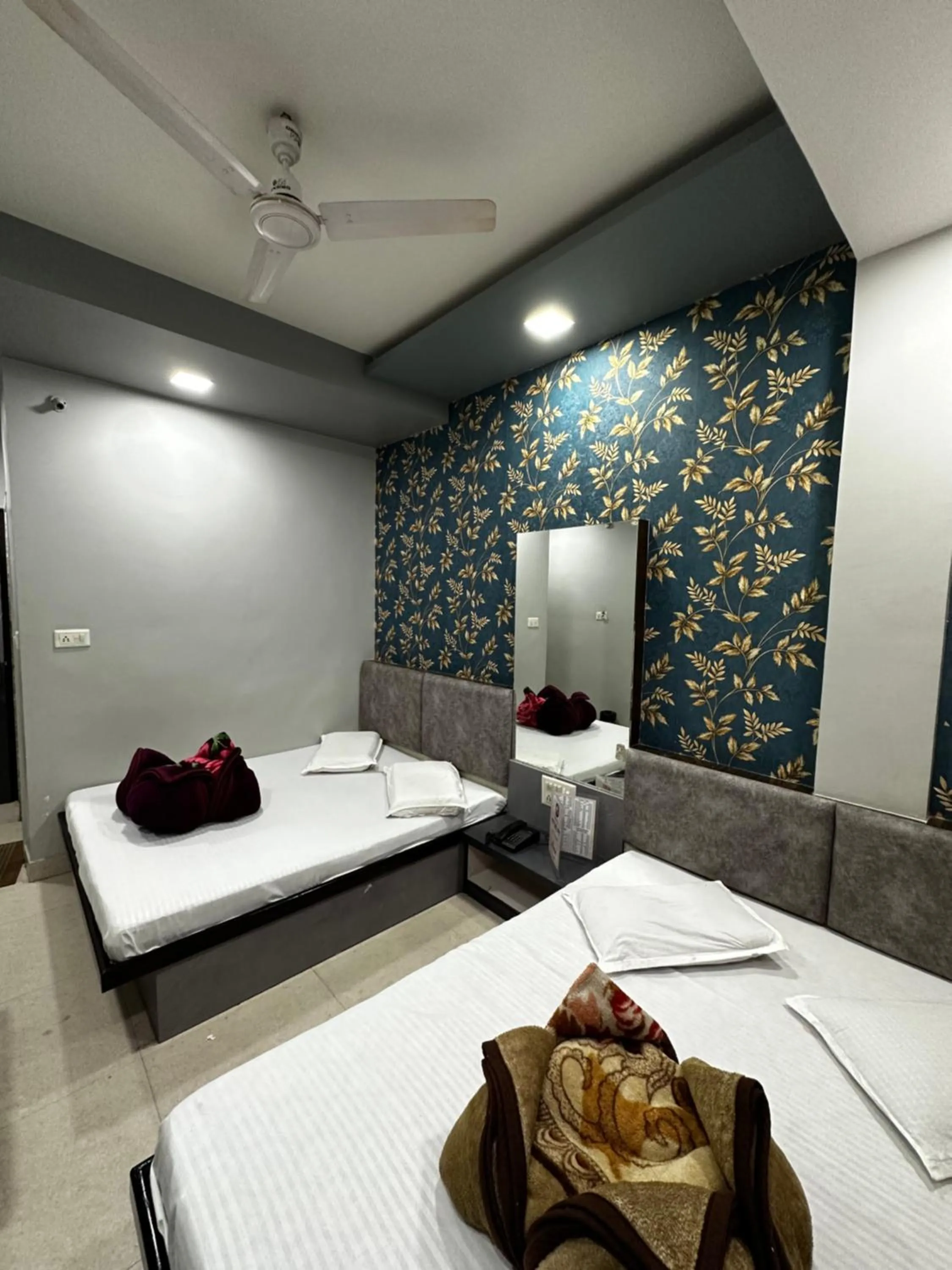 Bed in Hotel Mittal Inn