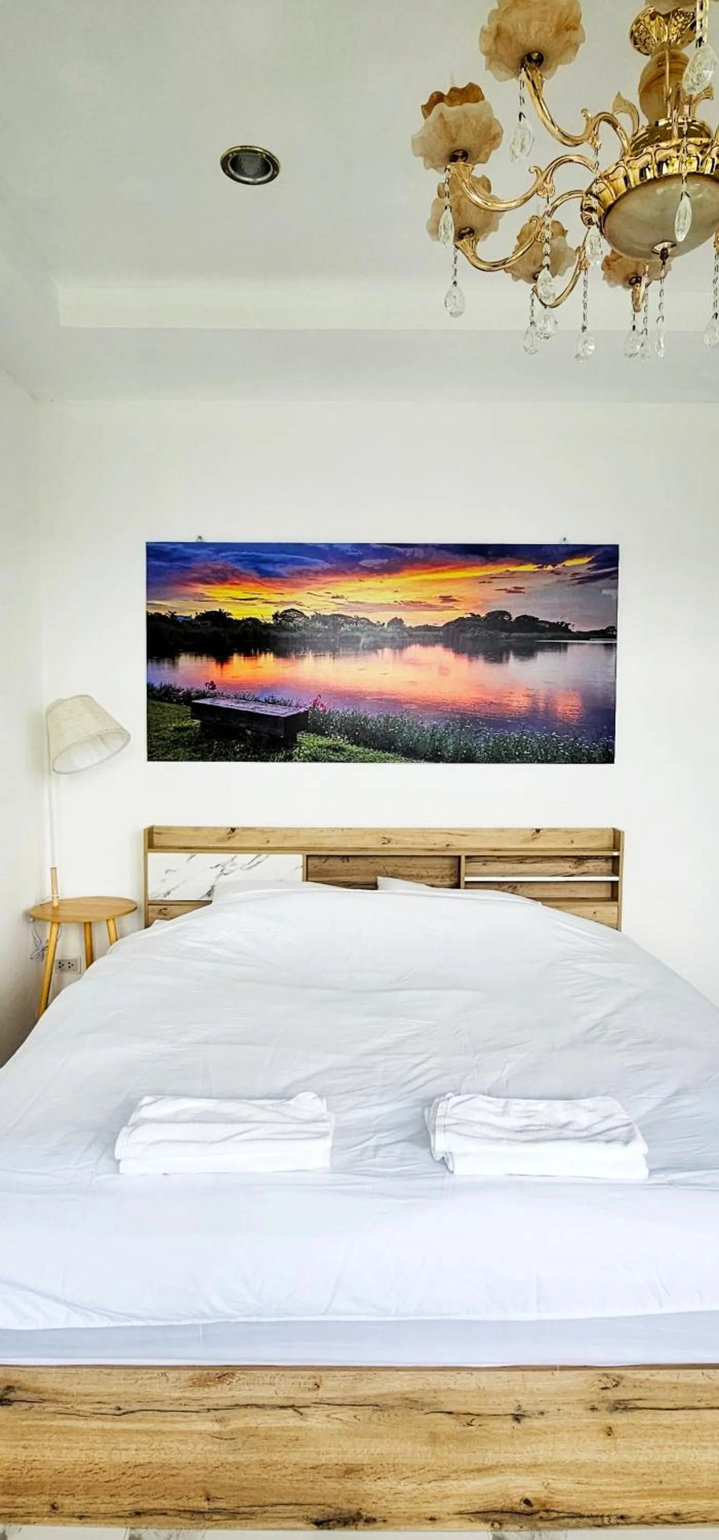 Bed in Tiny Island Lake Lodge