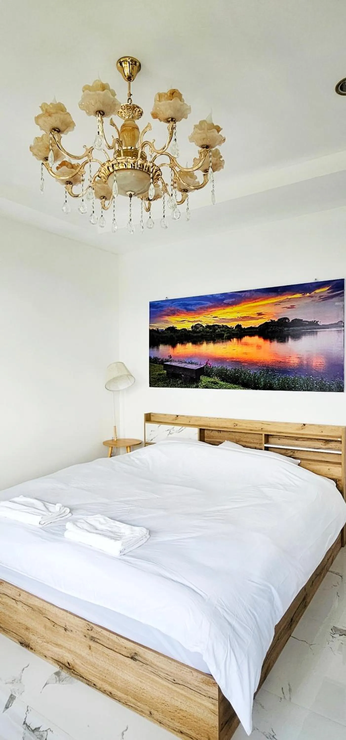 Bed in Tiny Island Lake Lodge