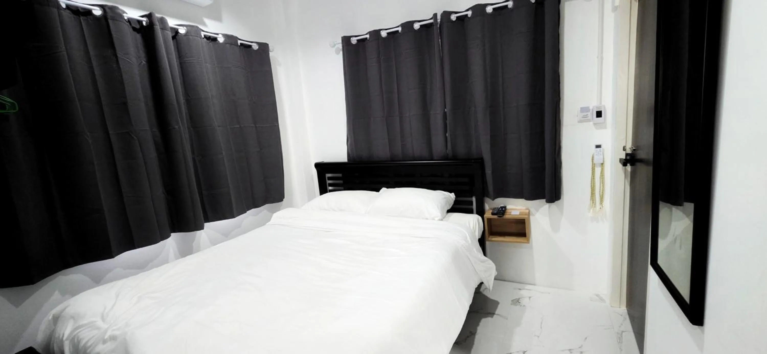 Bed in Tiny Island Lake Lodge