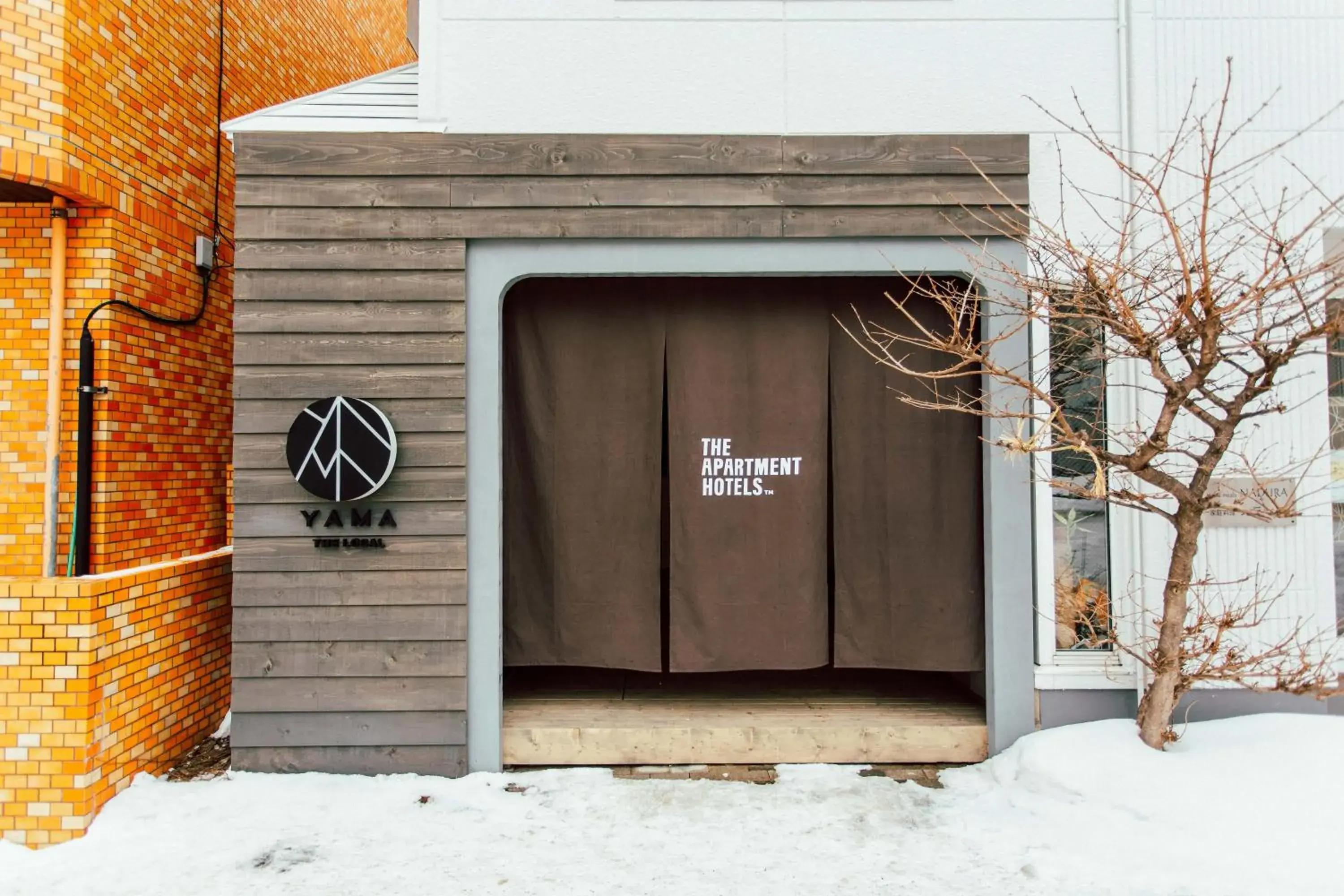 Property building in The Apartment Hotels YAMA Property building in The Apartment Hotels YAMA