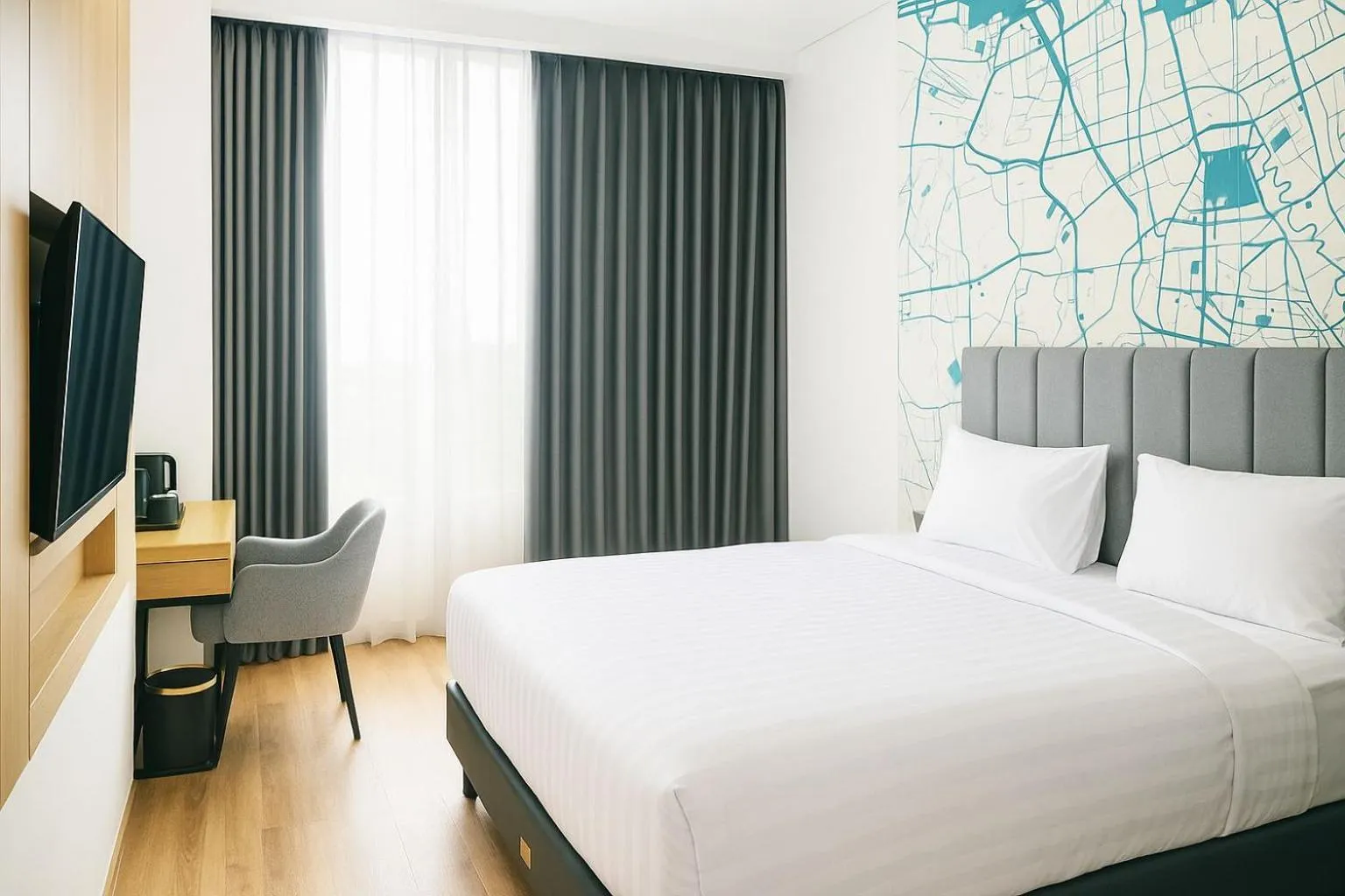 Bed in QNZ Hotel Jakarta