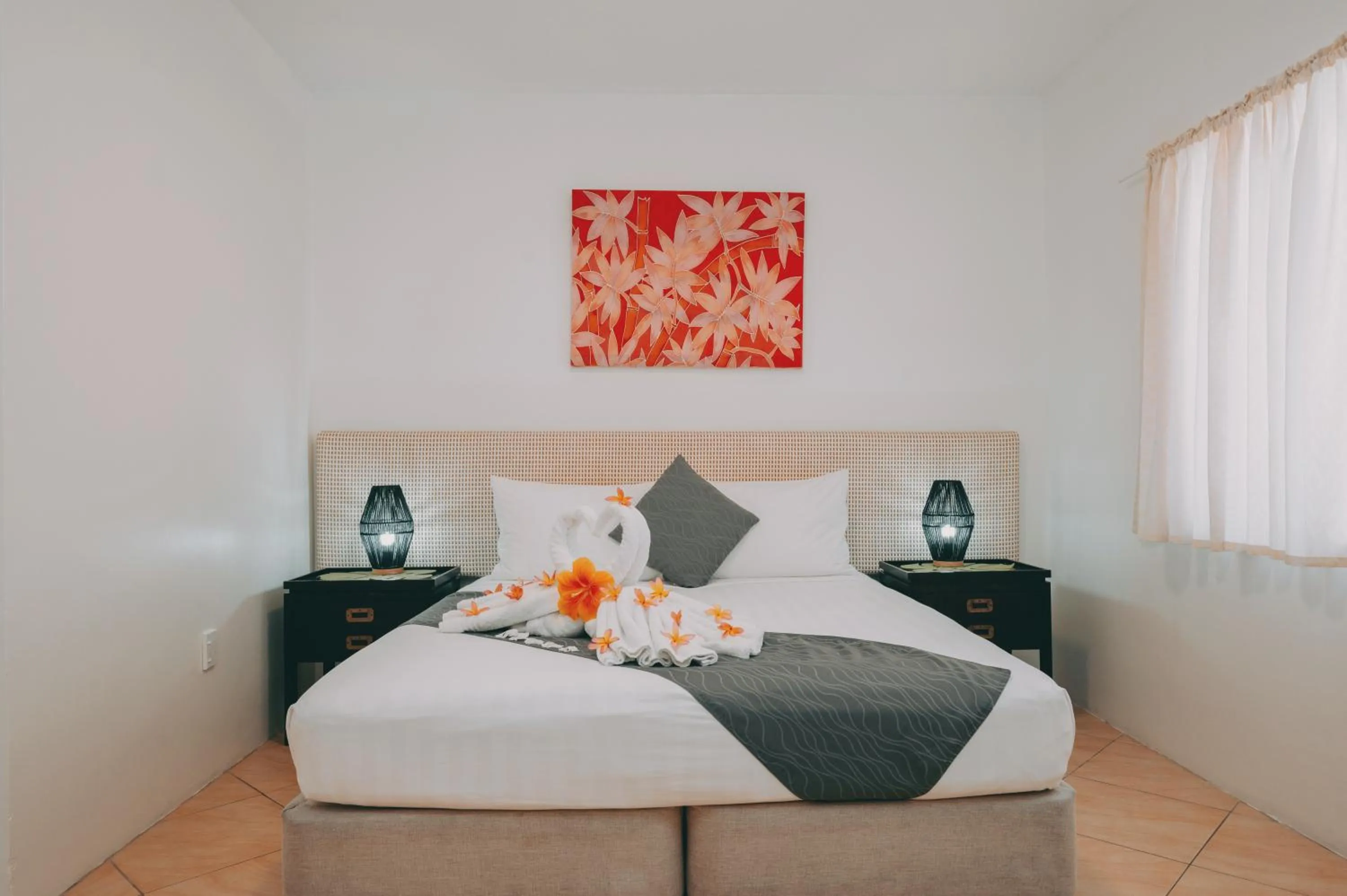 Bed in Moana Sands Beachfront Villas