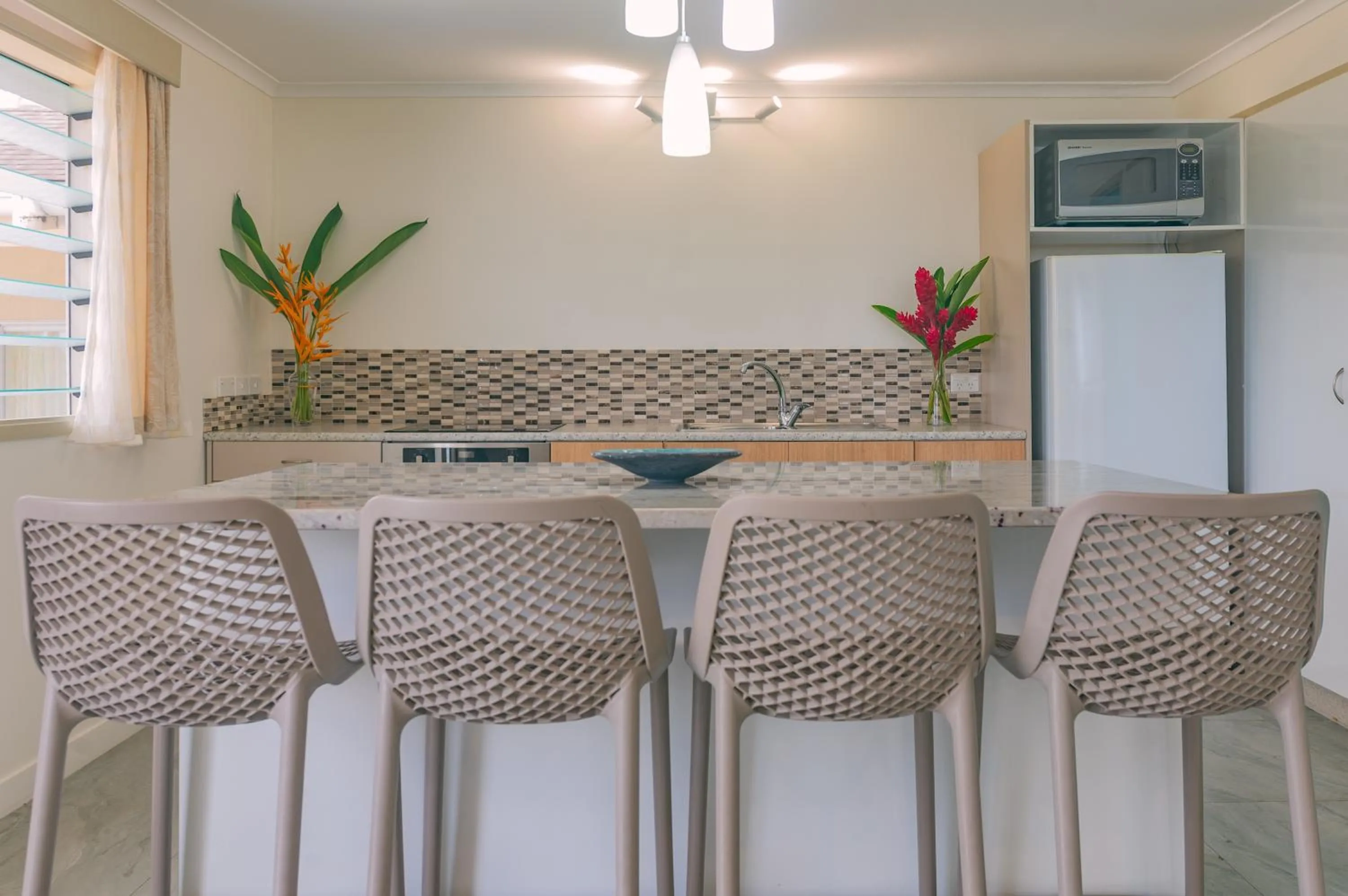 Kitchen or kitchenette in Moana Sands Beachfront Villas