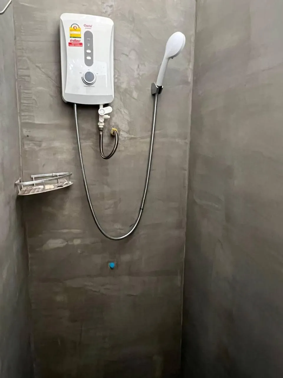 Shower in Kalinga Art Home Guest House