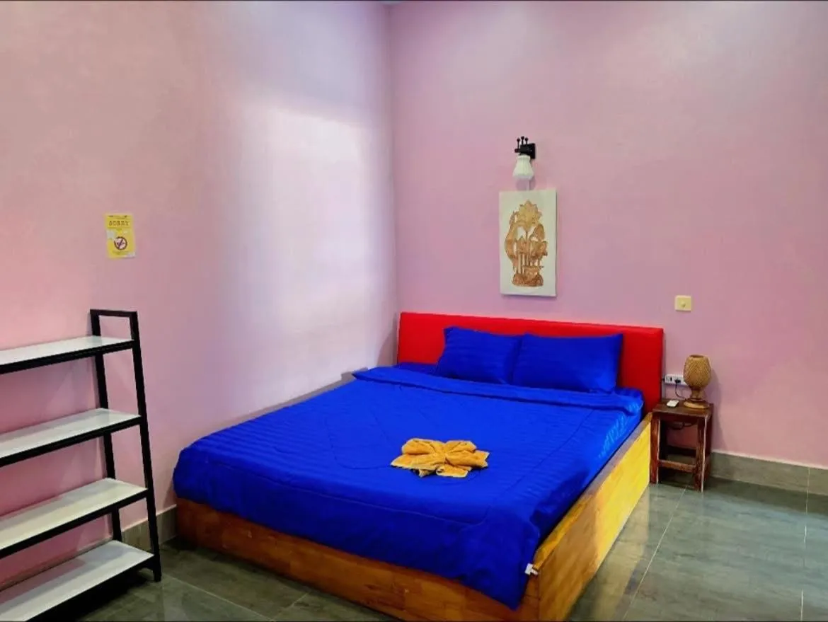 Bed in Kalinga Art Home Guest House