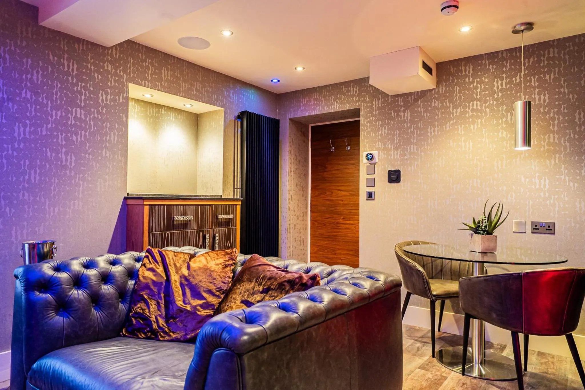 Seating area in Church Suites by The Cranleigh Boutique