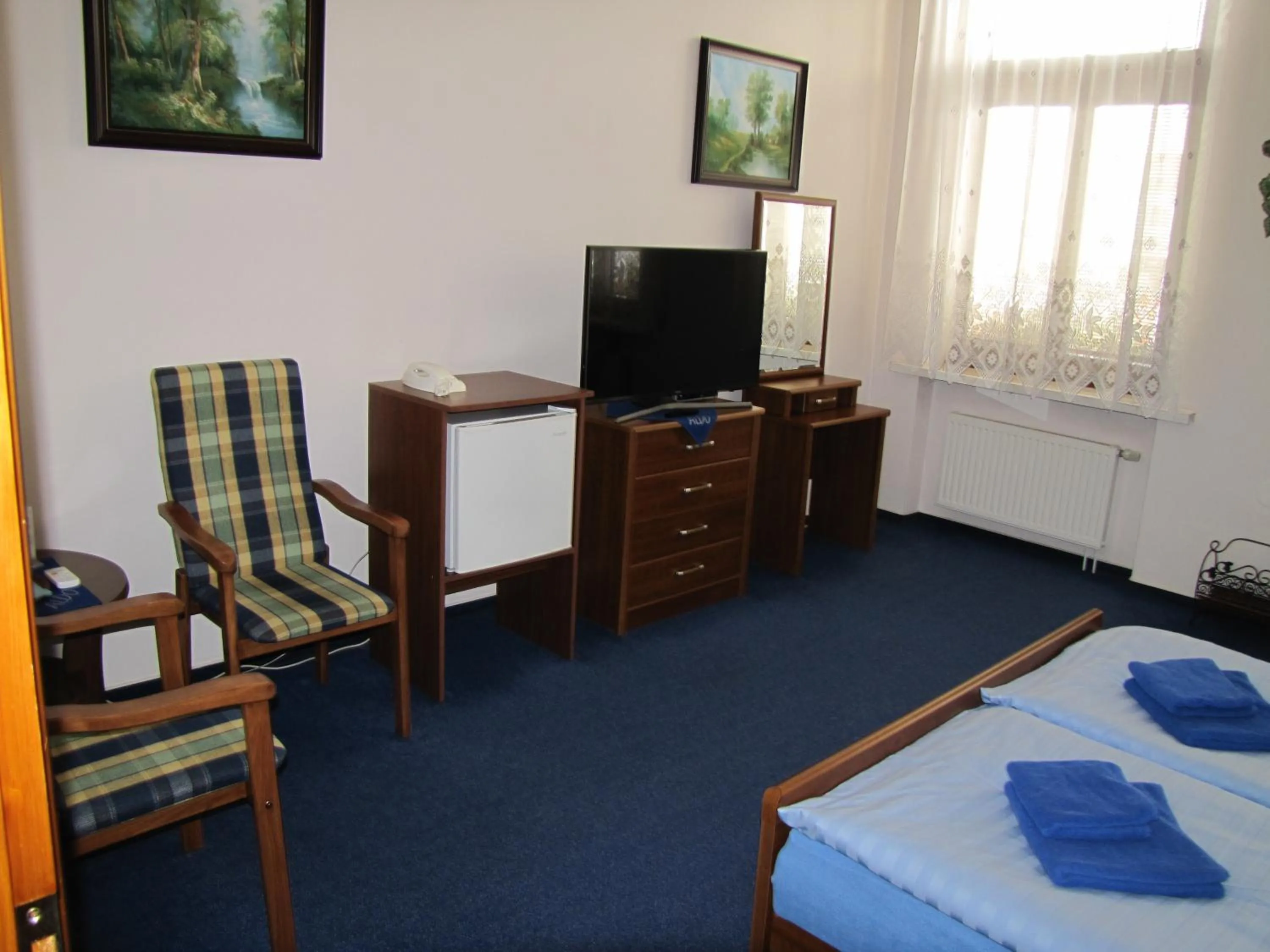 Seating area, Bed in Penzion Aldo