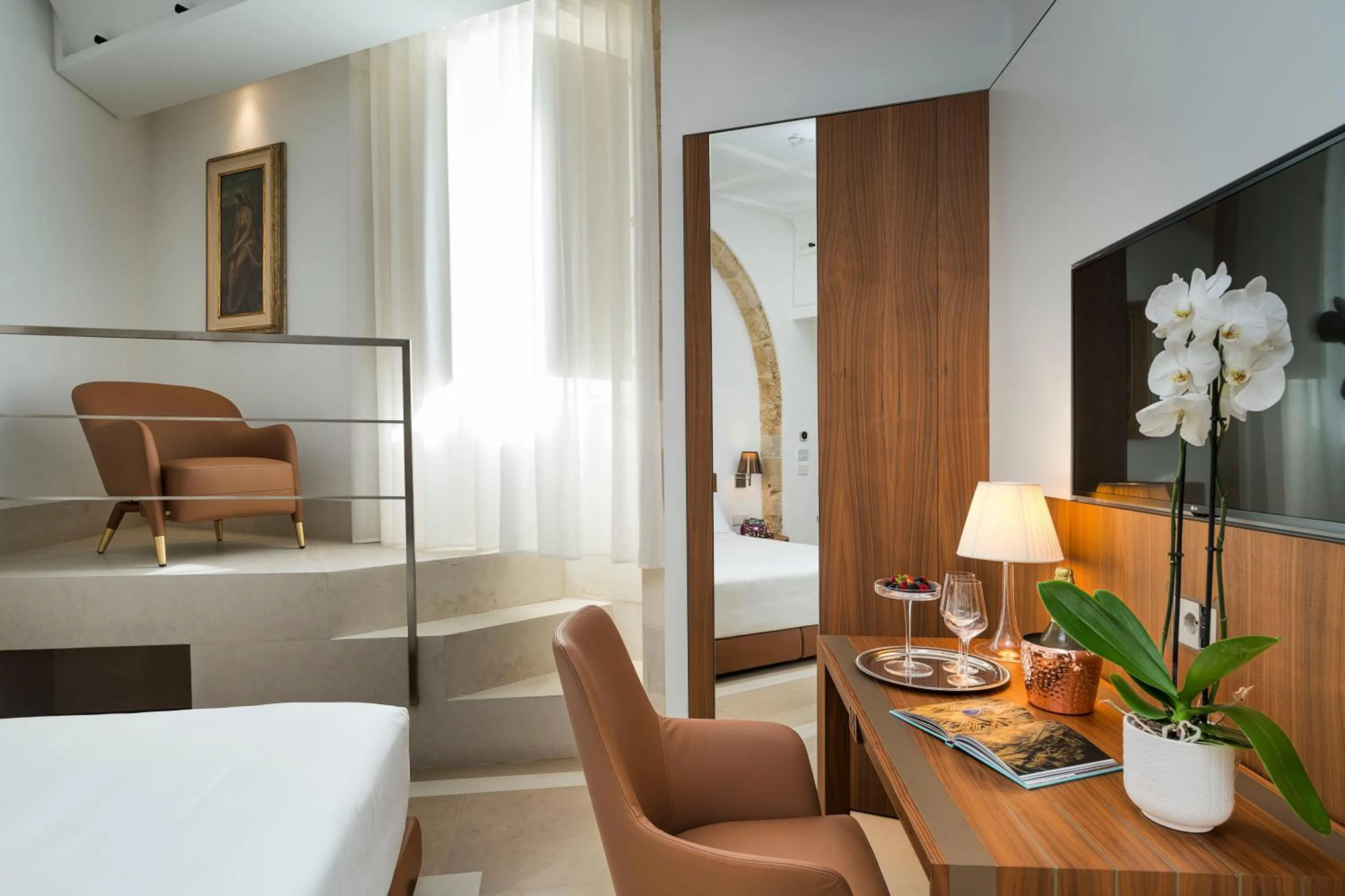 Photo of the whole room in Maniace Boutique Hotel Ortigia - UNA Esperienze