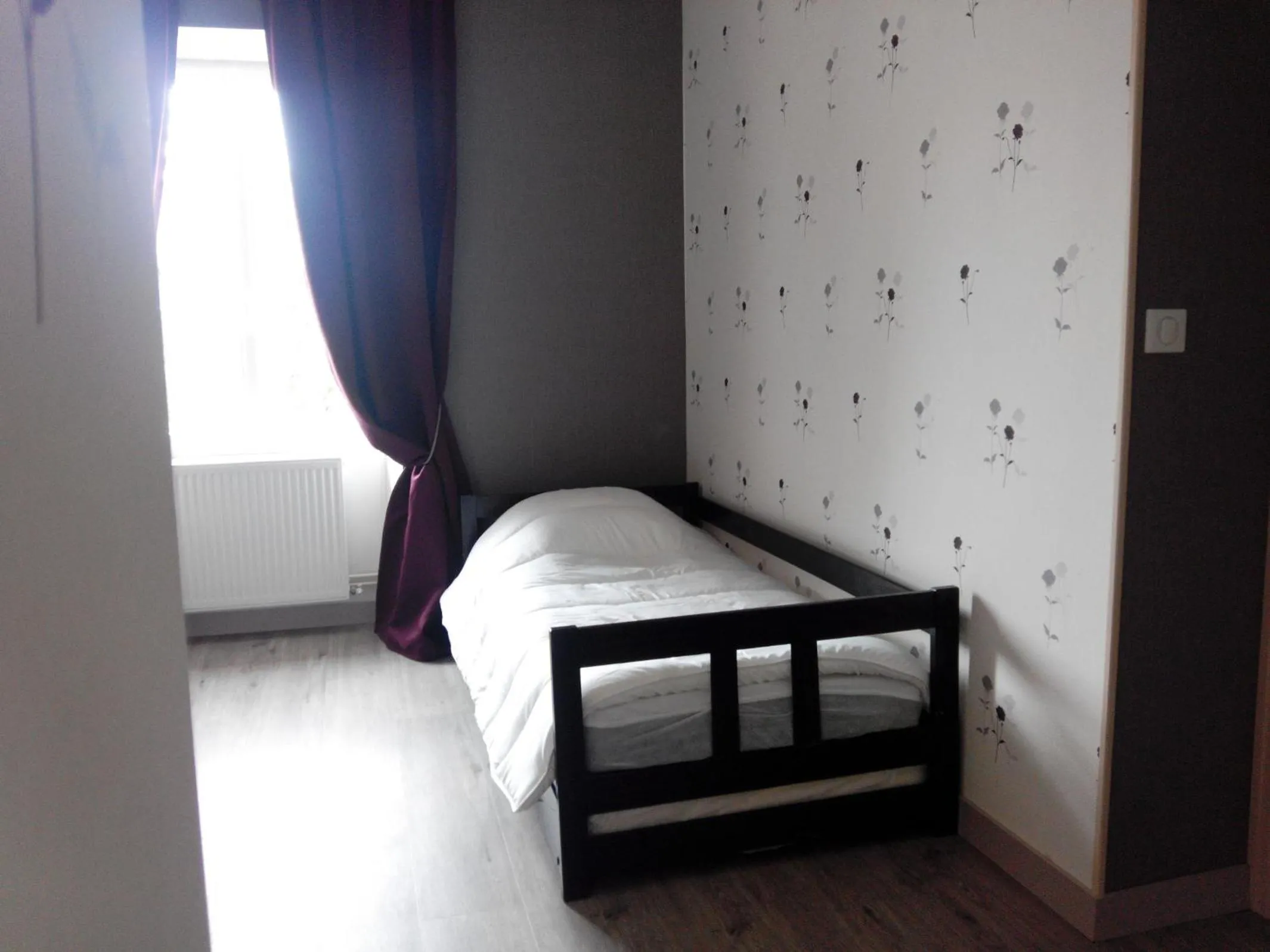 Bed in Chambres d'hôtes -- Le Clos de Gémozac