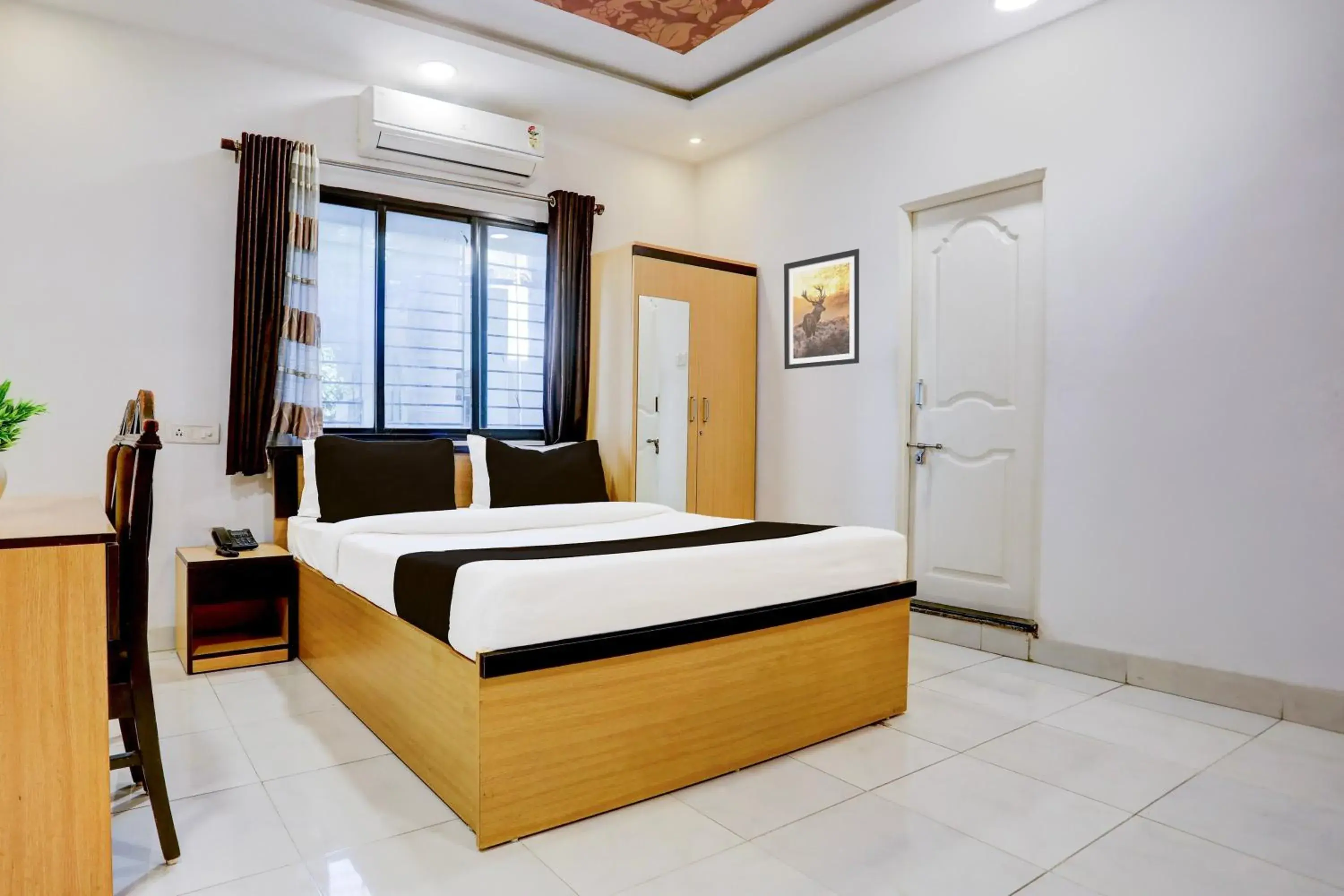 Bedroom in Hotel O GREEN PALMS Bedroom in Hotel O GREEN PALMS