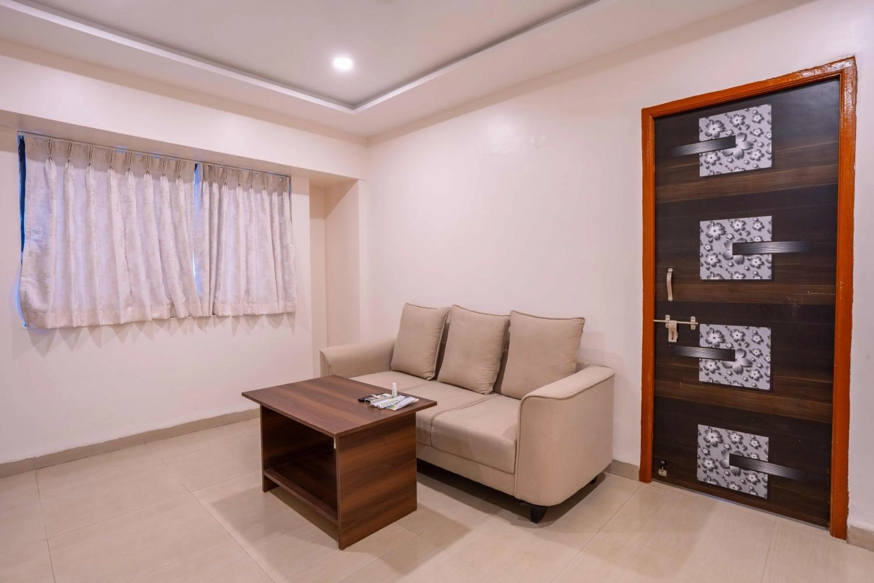 Bedroom in Treebo Royal Comfort Atithi