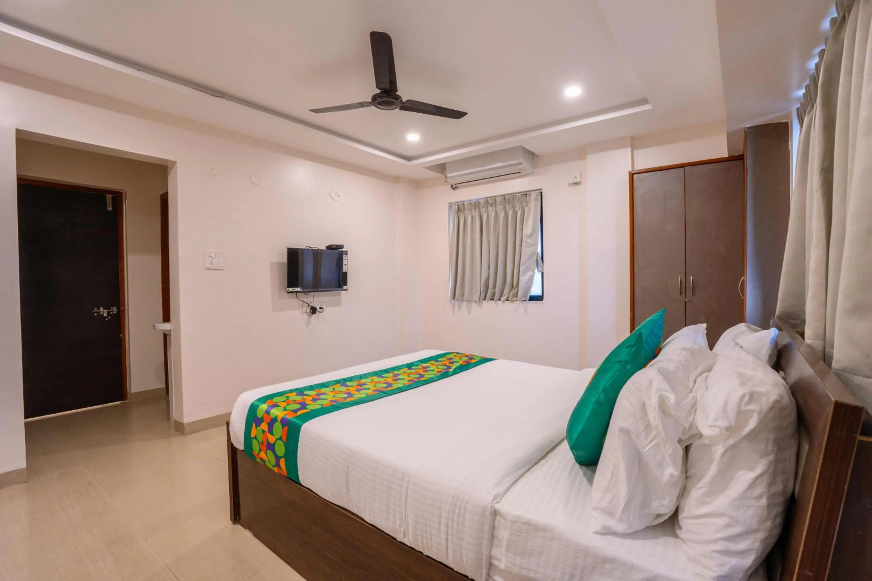 Bedroom, Bed in Treebo Royal Comfort Atithi