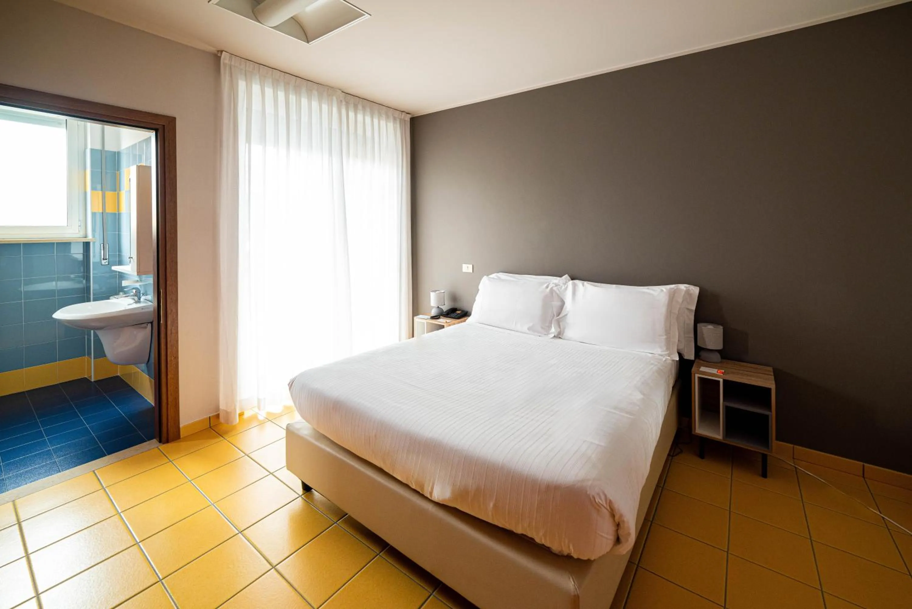 Bedroom, Bed in Phi Hotel Homy Druento