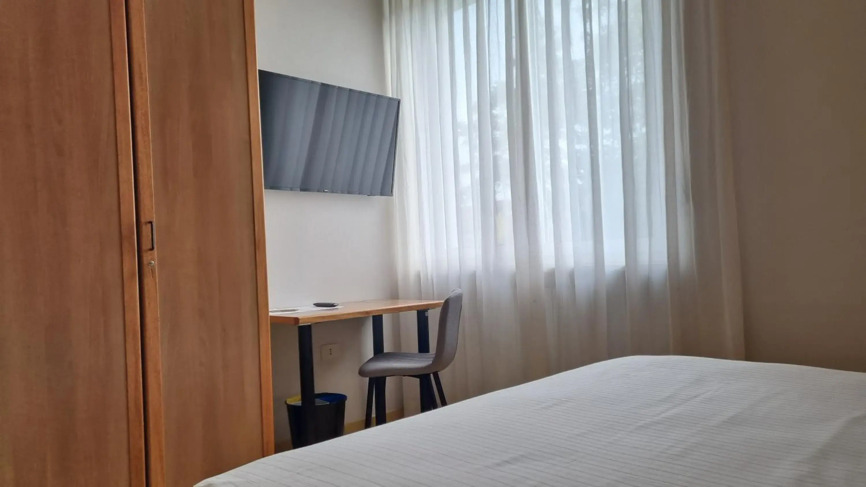 Bed in Phi Hotel Homy Druento Bed in Phi Hotel Homy Druento