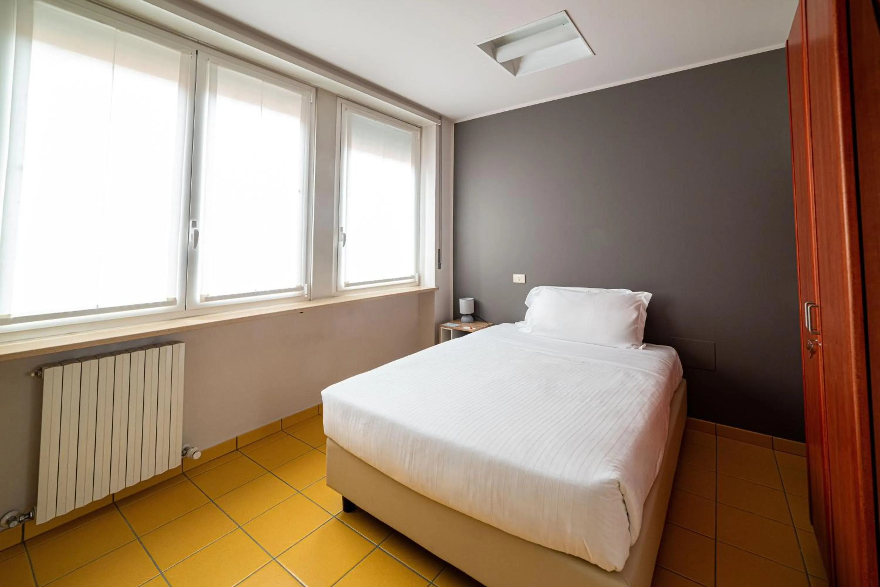 Bedroom, Bed in Phi Hotel Homy Druento