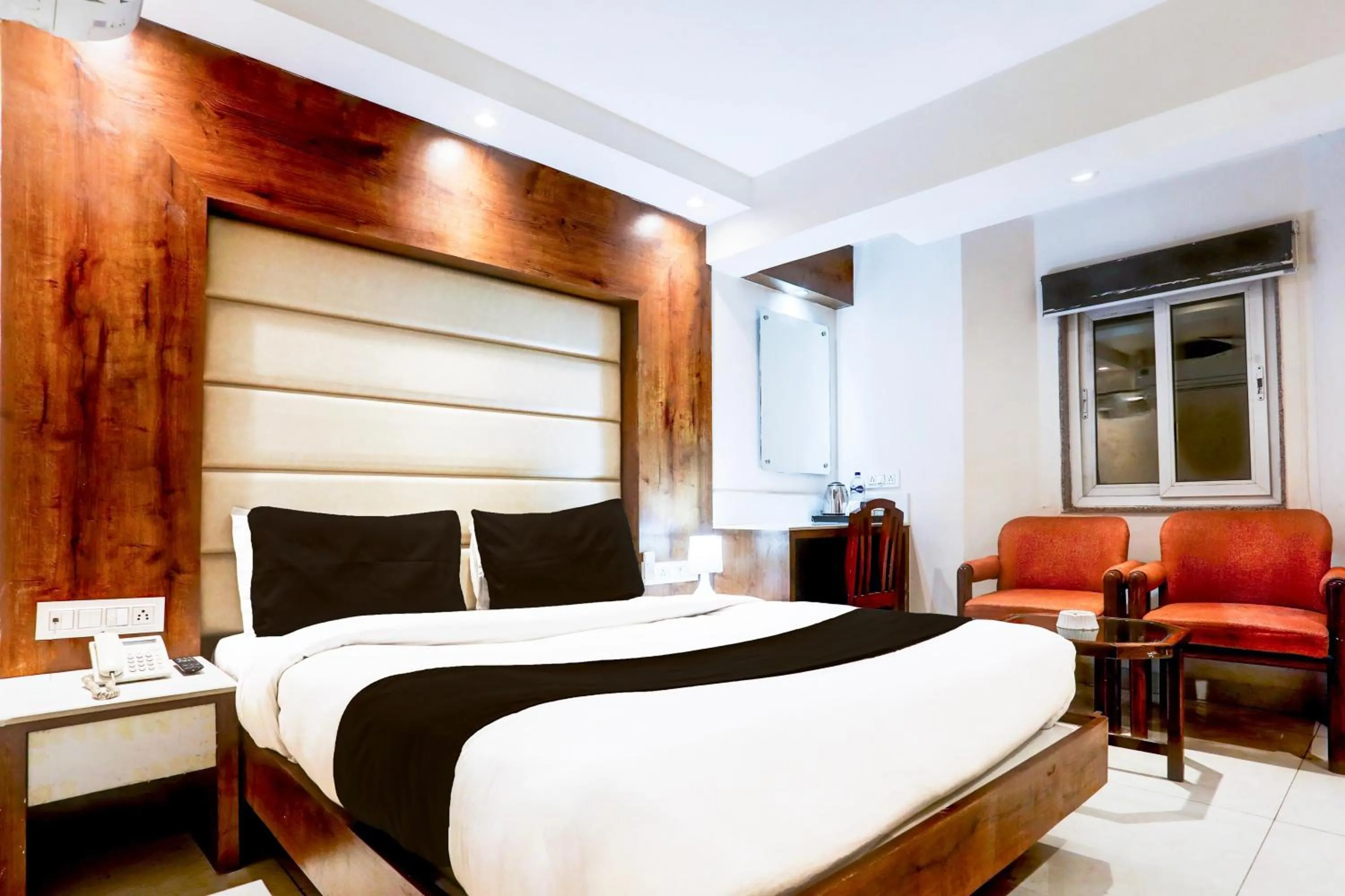 Bedroom, Bed in Super Townhouse Padav Square Gwalior Formerly Hotel Shelter