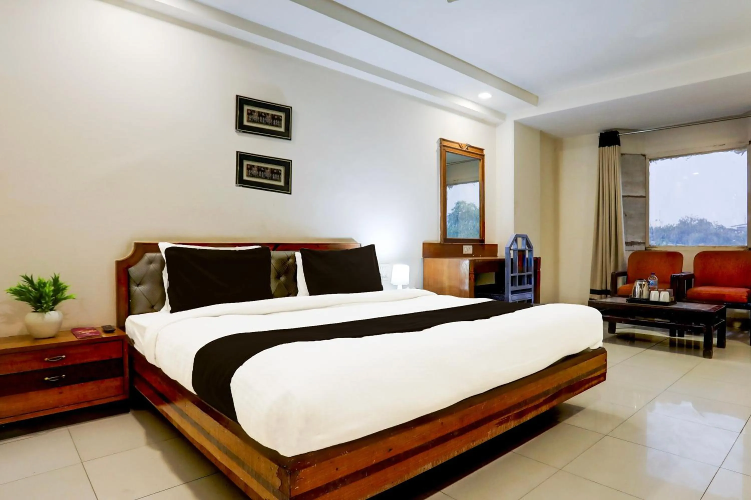 Bedroom, Bed in Super Townhouse Padav Square Gwalior Formerly Hotel Shelter