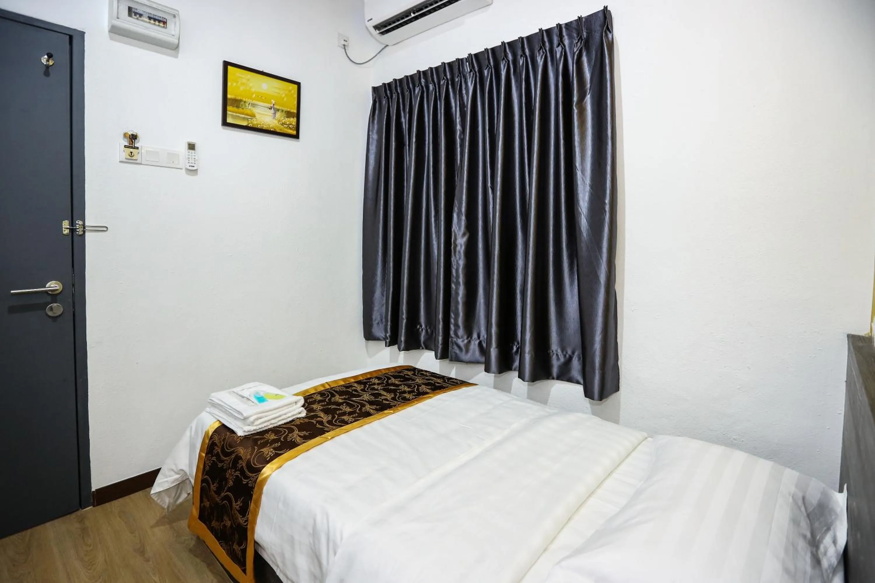Bedroom, Bed in New Dawn Hotel Pontian Sdn Bhd