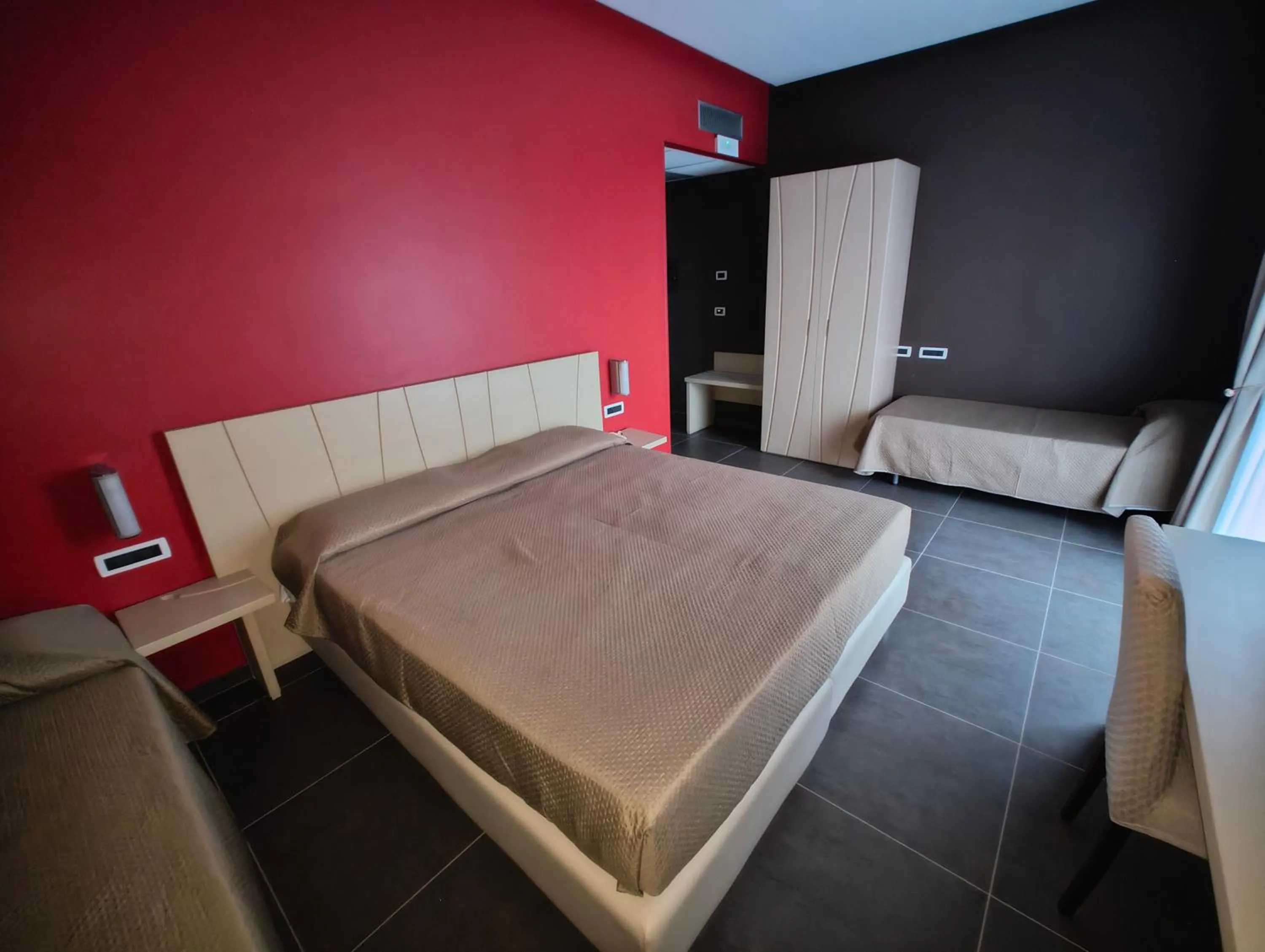 Bed in Sunrise Hotel