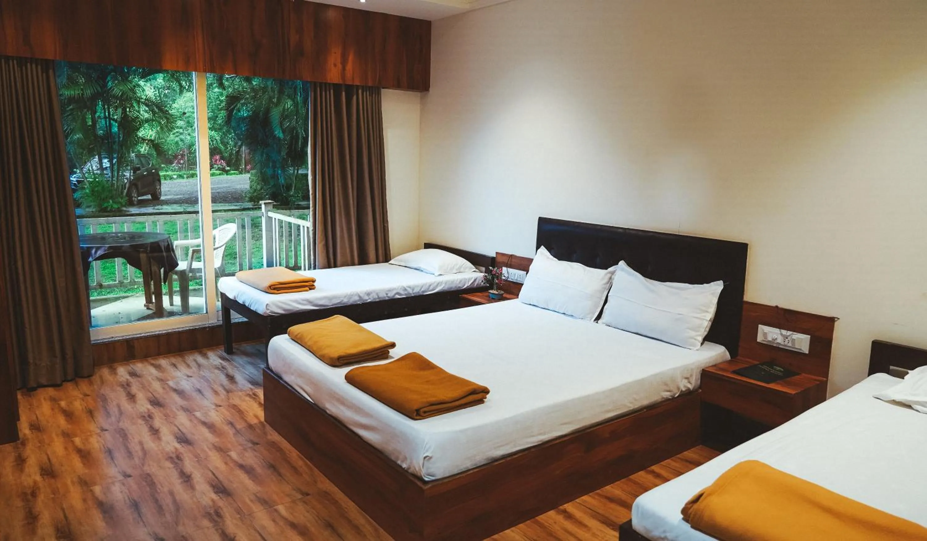 Bed in Whispering Peepul Resort