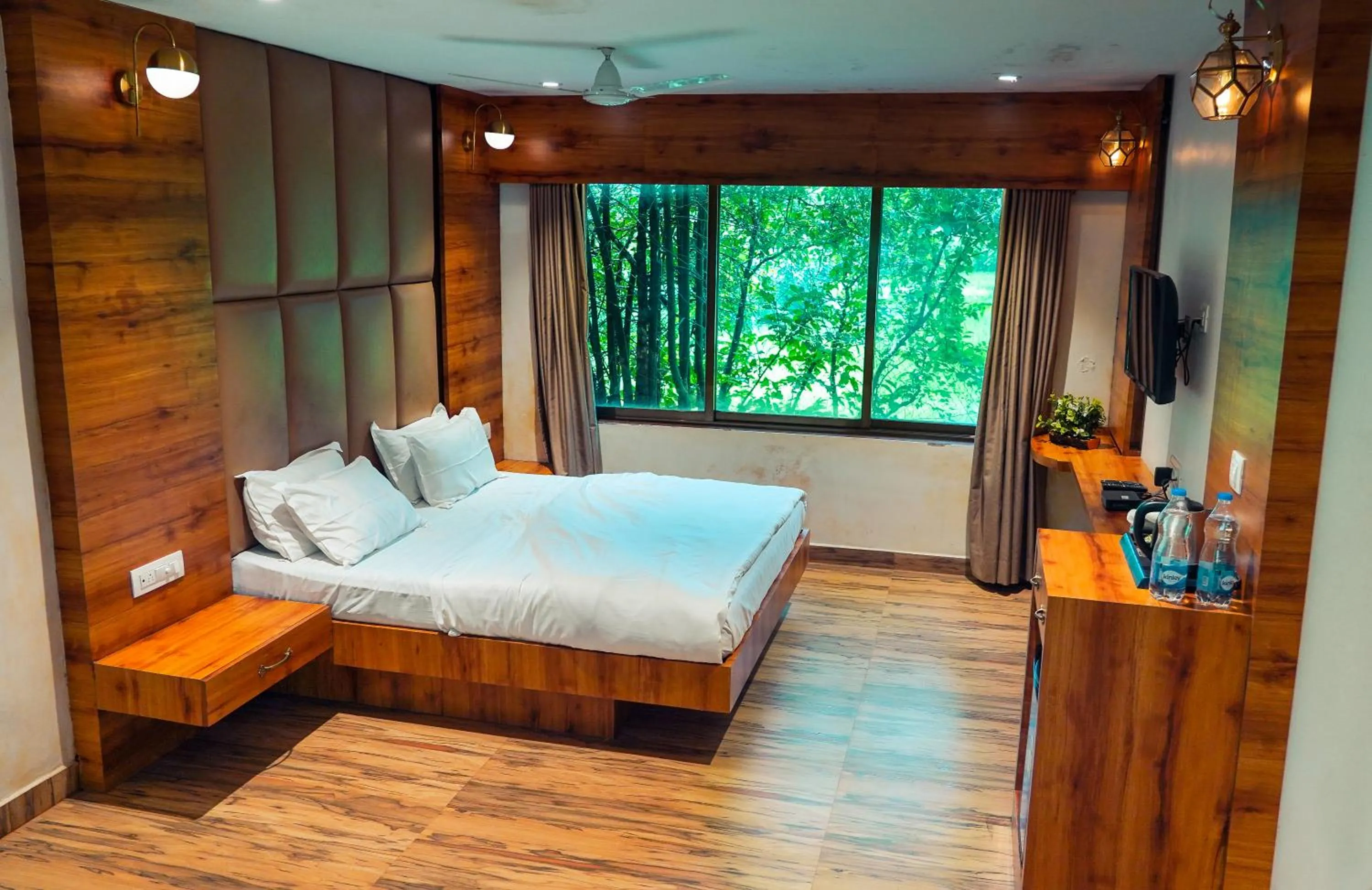 Bed in Whispering Peepul Resort