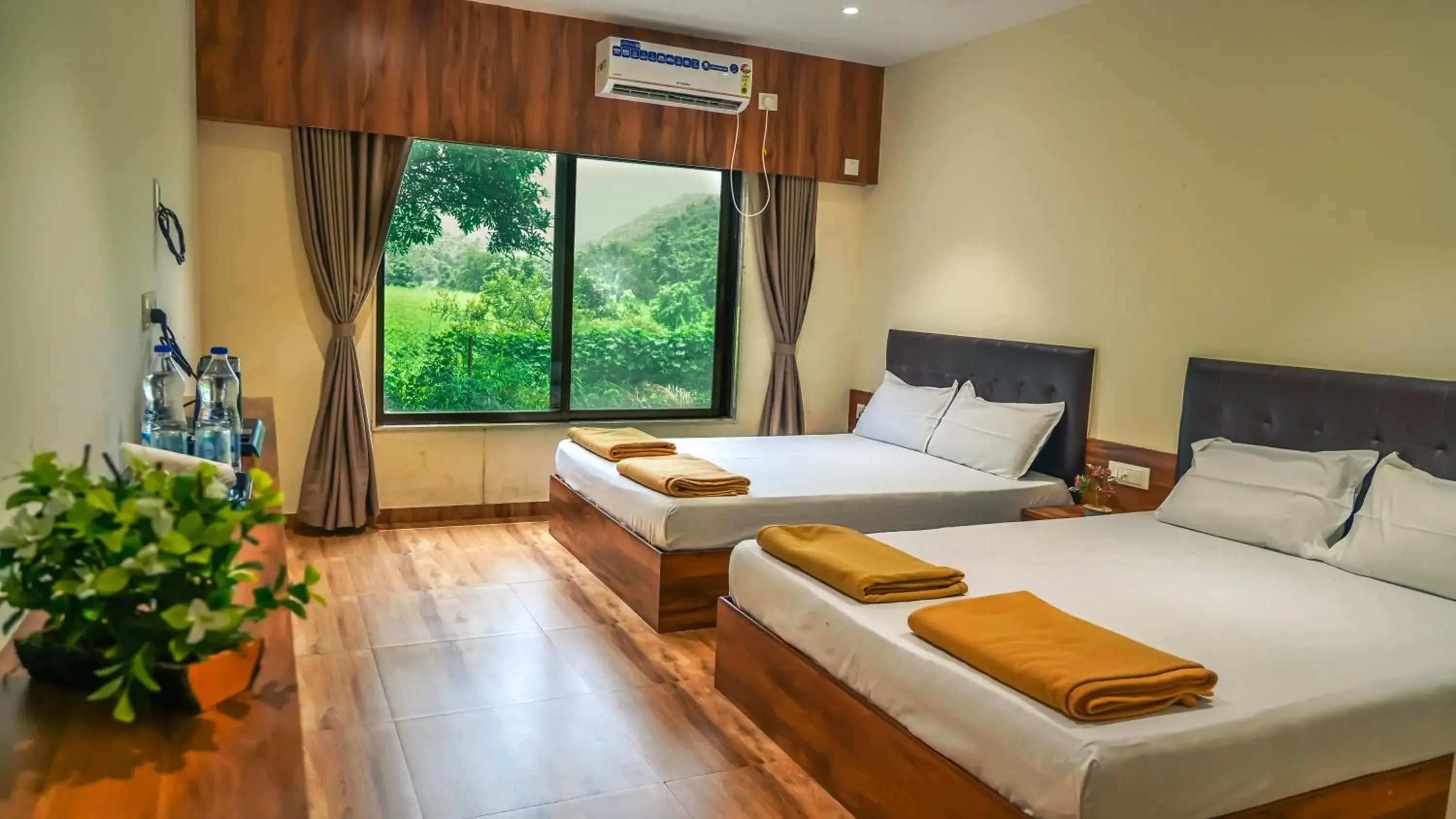 Bed in Whispering Peepul Resort Bed in Whispering Peepul Resort