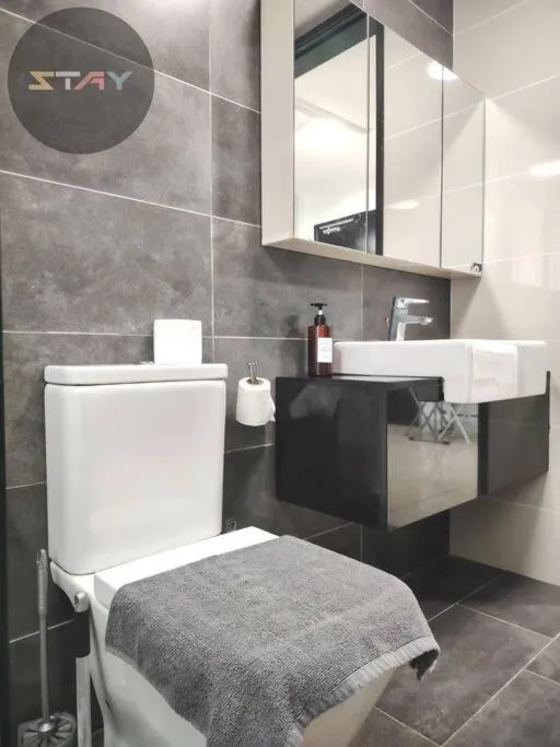 Bed in Almas Suites Cozy King Bed Studio Netflix By STAY