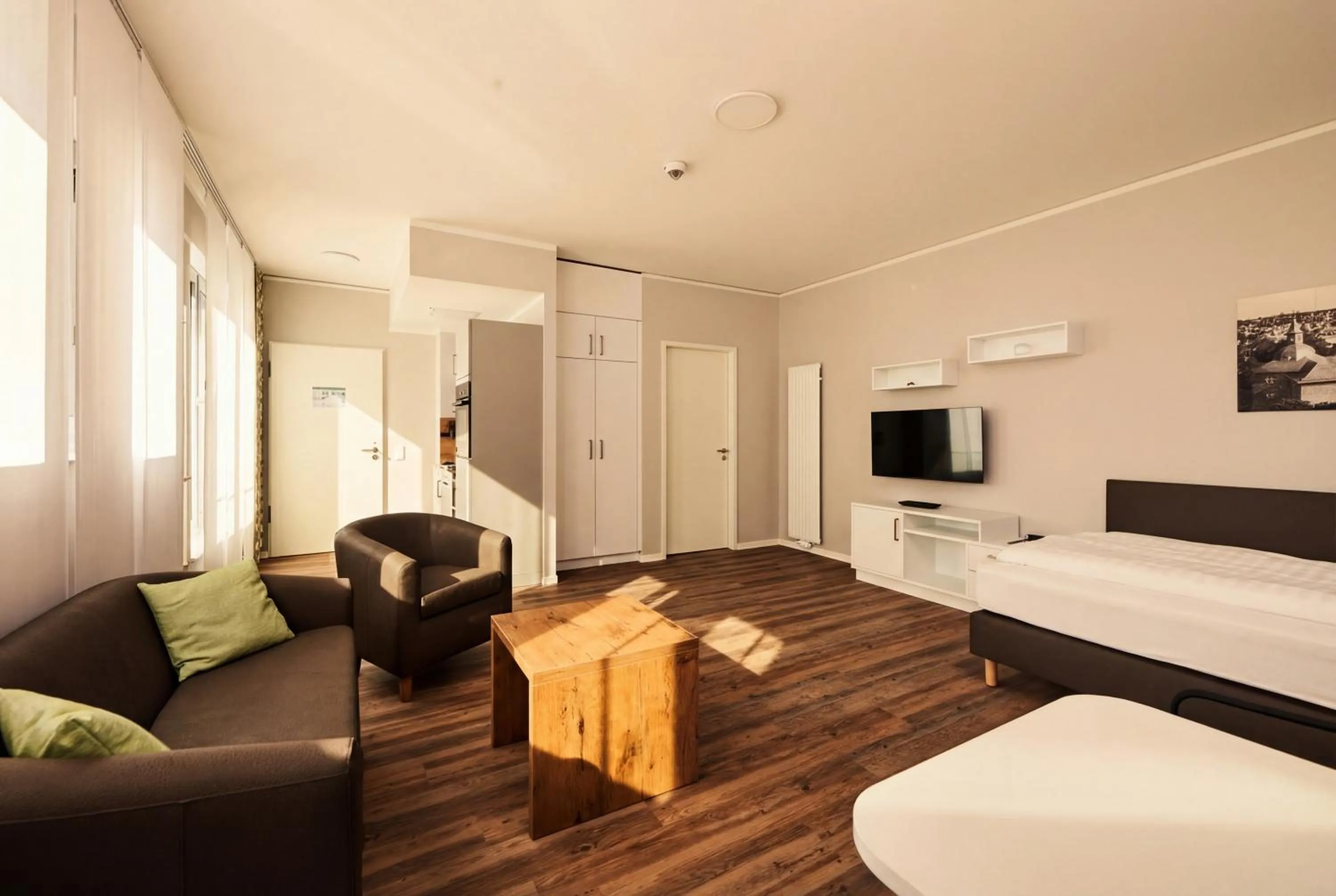 Bed in ADAPT APARTMENT HOTEL Siegen
