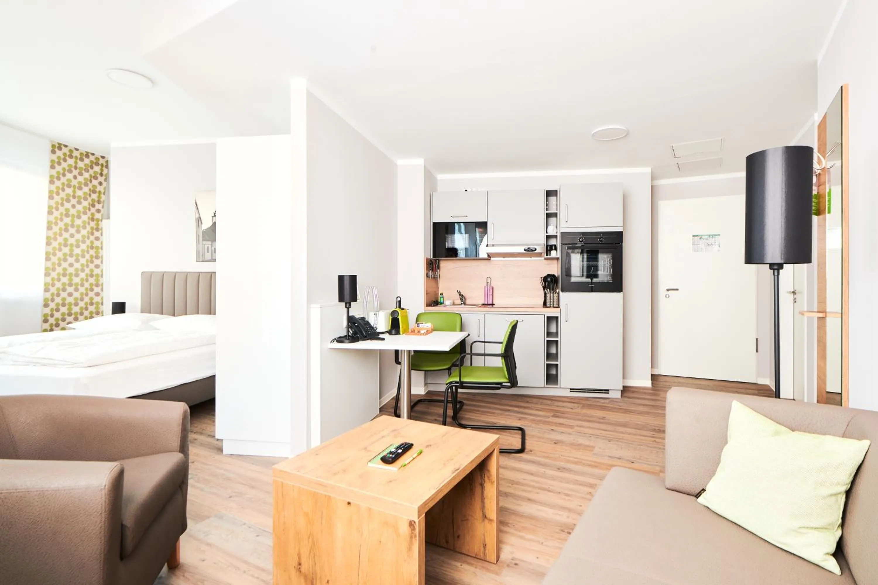 Bed in ADAPT APARTMENT HOTEL Siegen